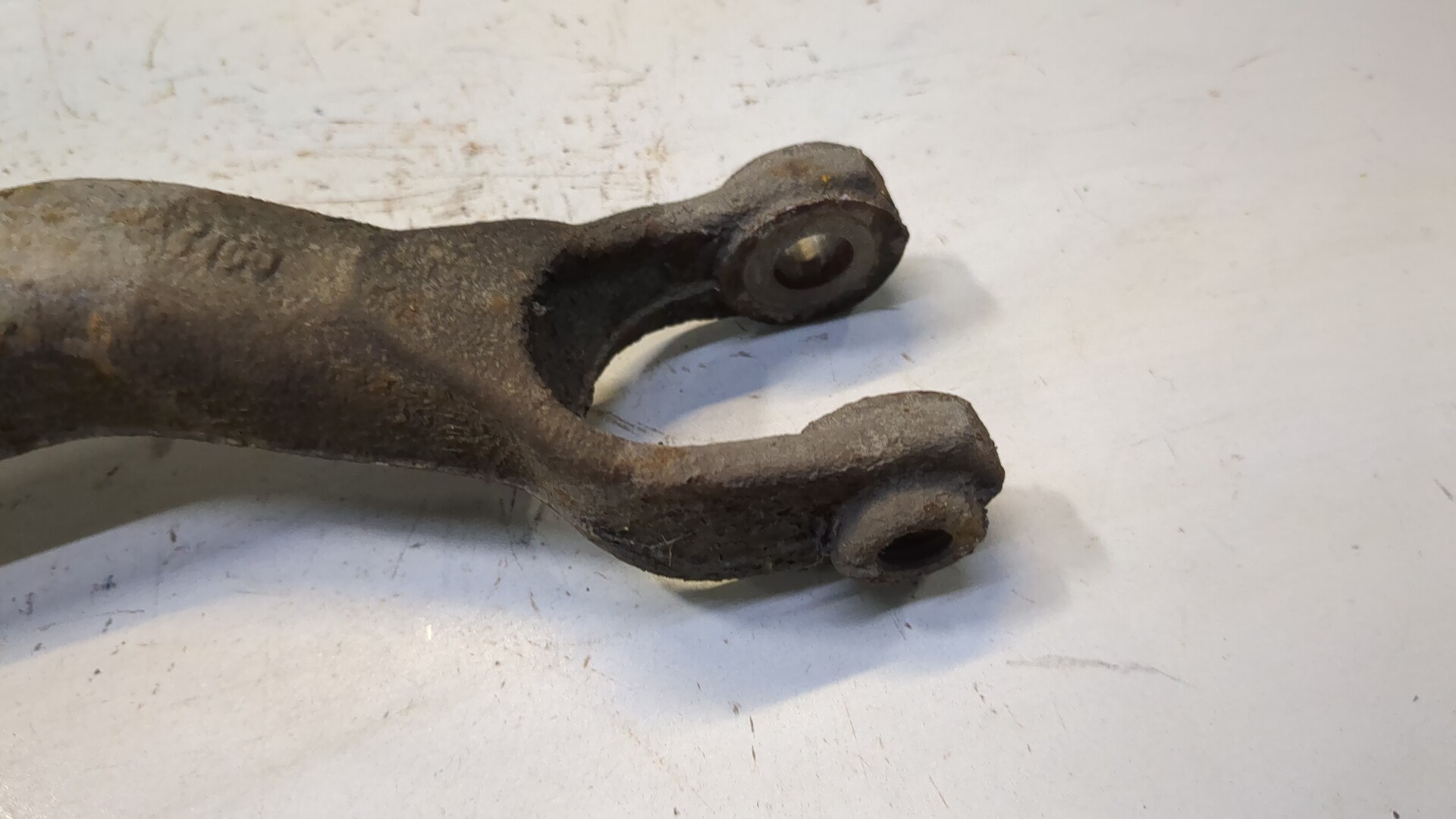 Рычаг задний левый