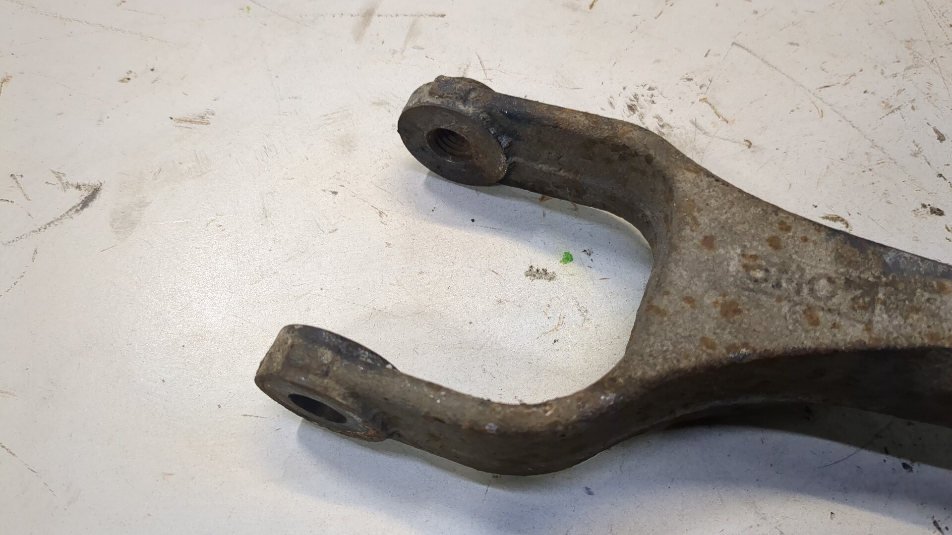 Рычаг задний левый