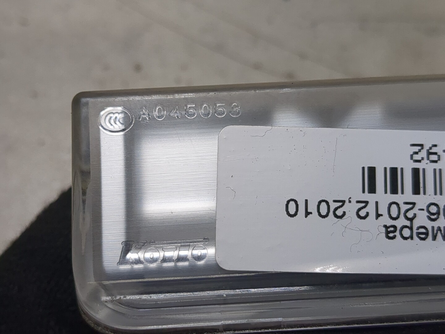 Фонарь подсветки номера