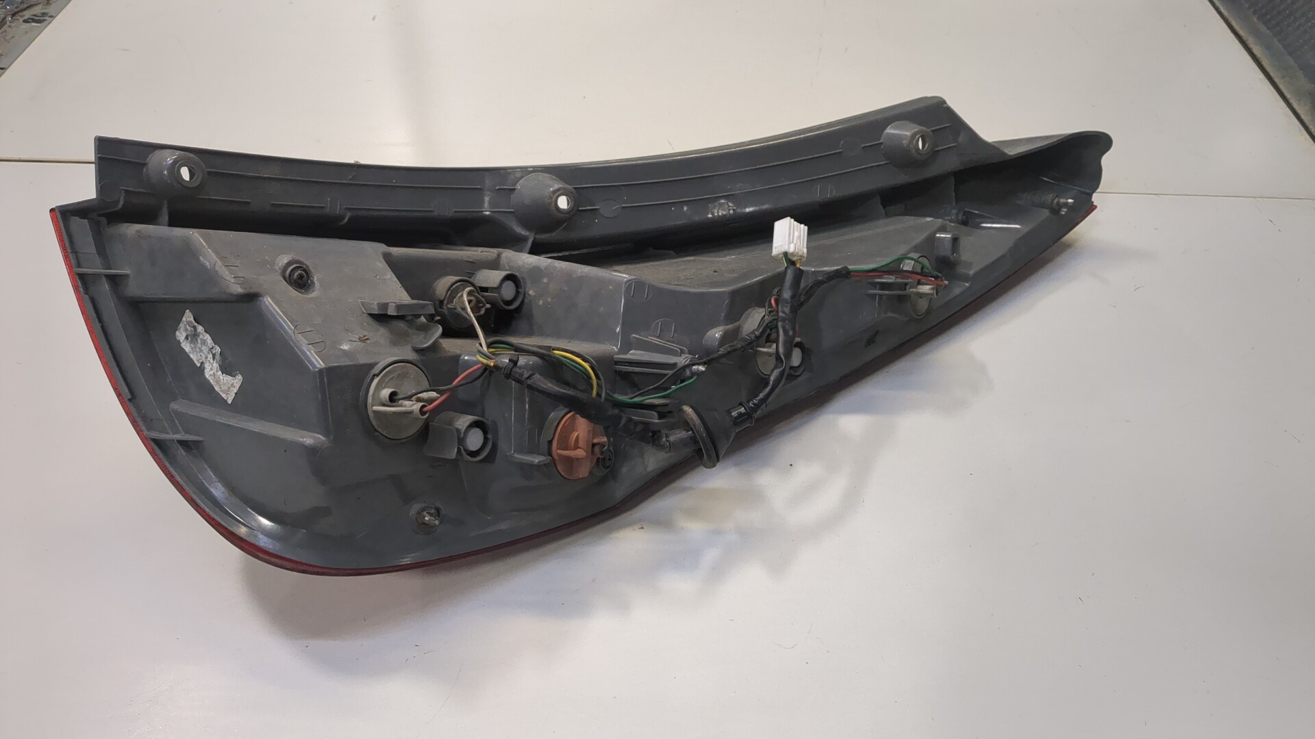 Фонарь задний левый