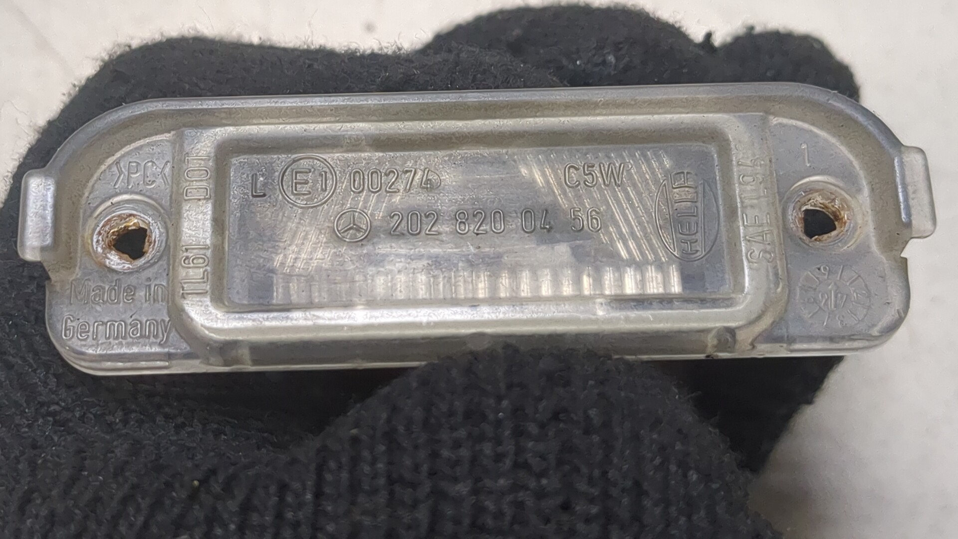 Фонарь подсветки номера