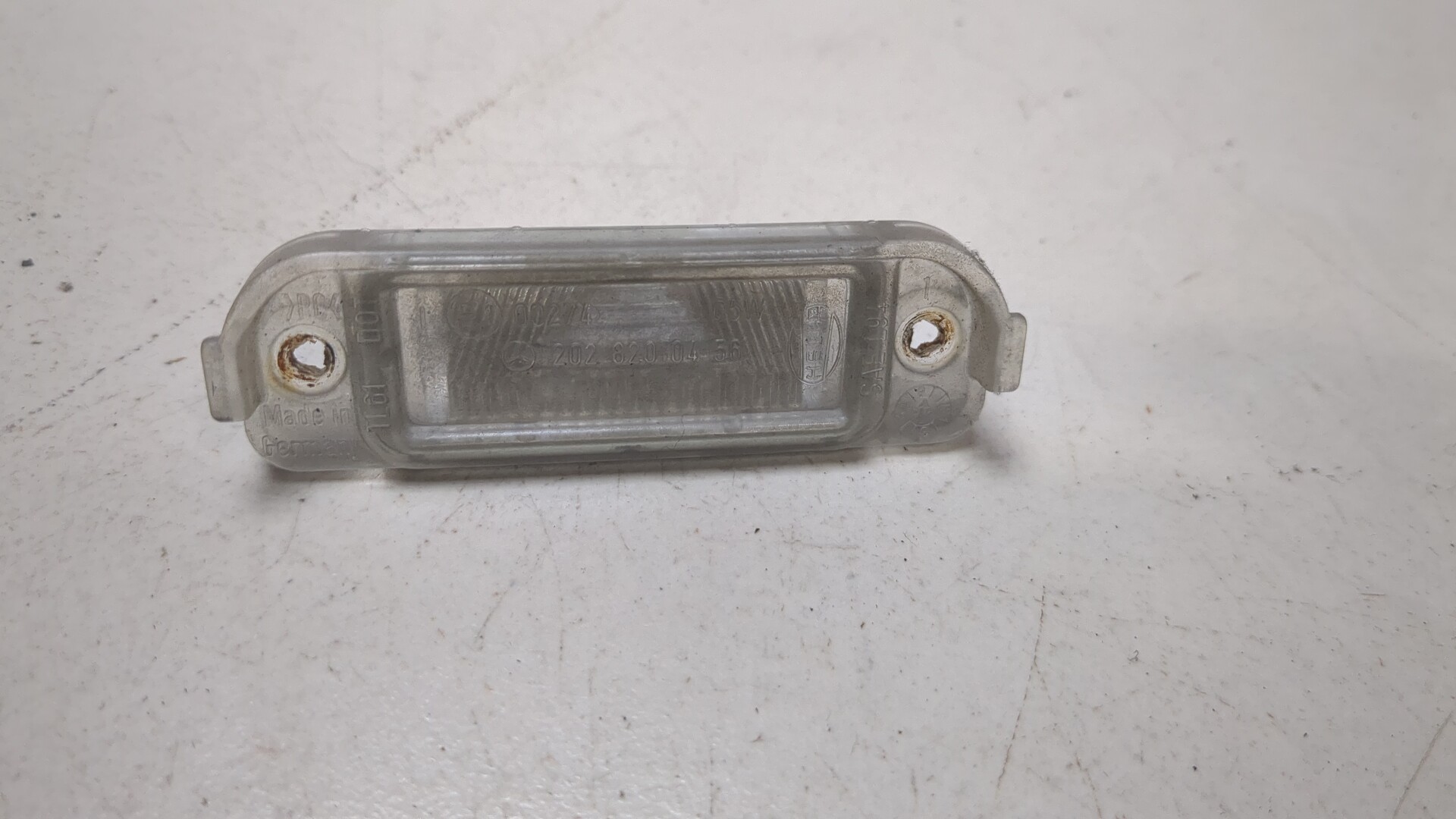 Фонарь подсветки номера