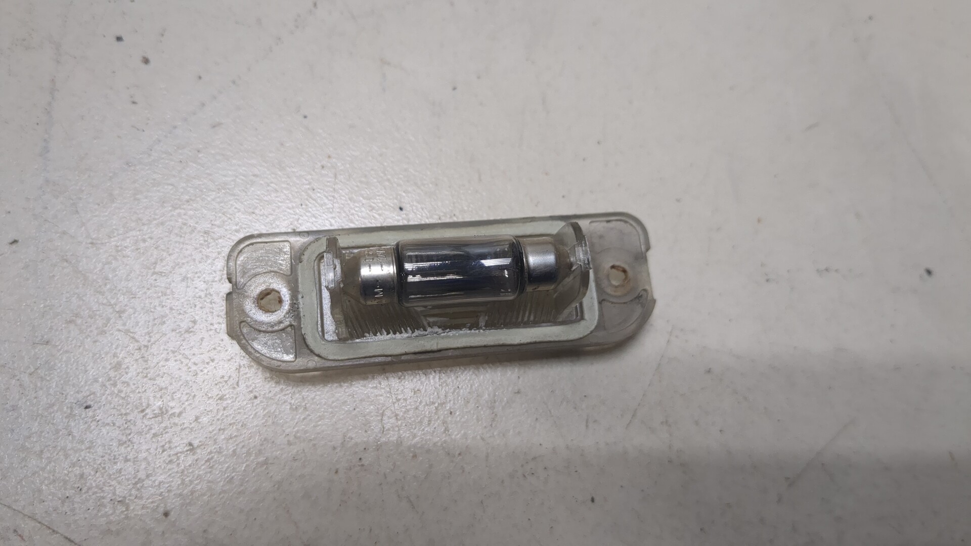 Фонарь подсветки номера