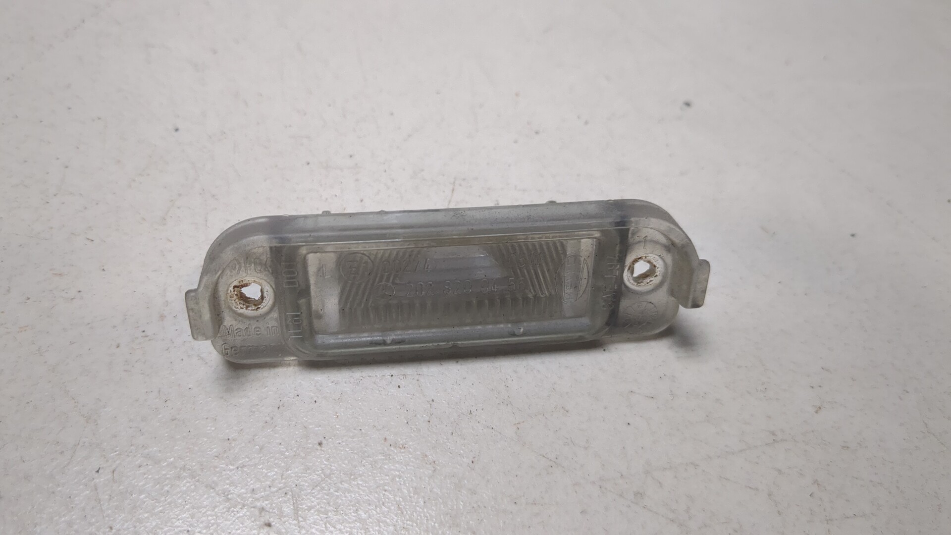 Фонарь подсветки номера