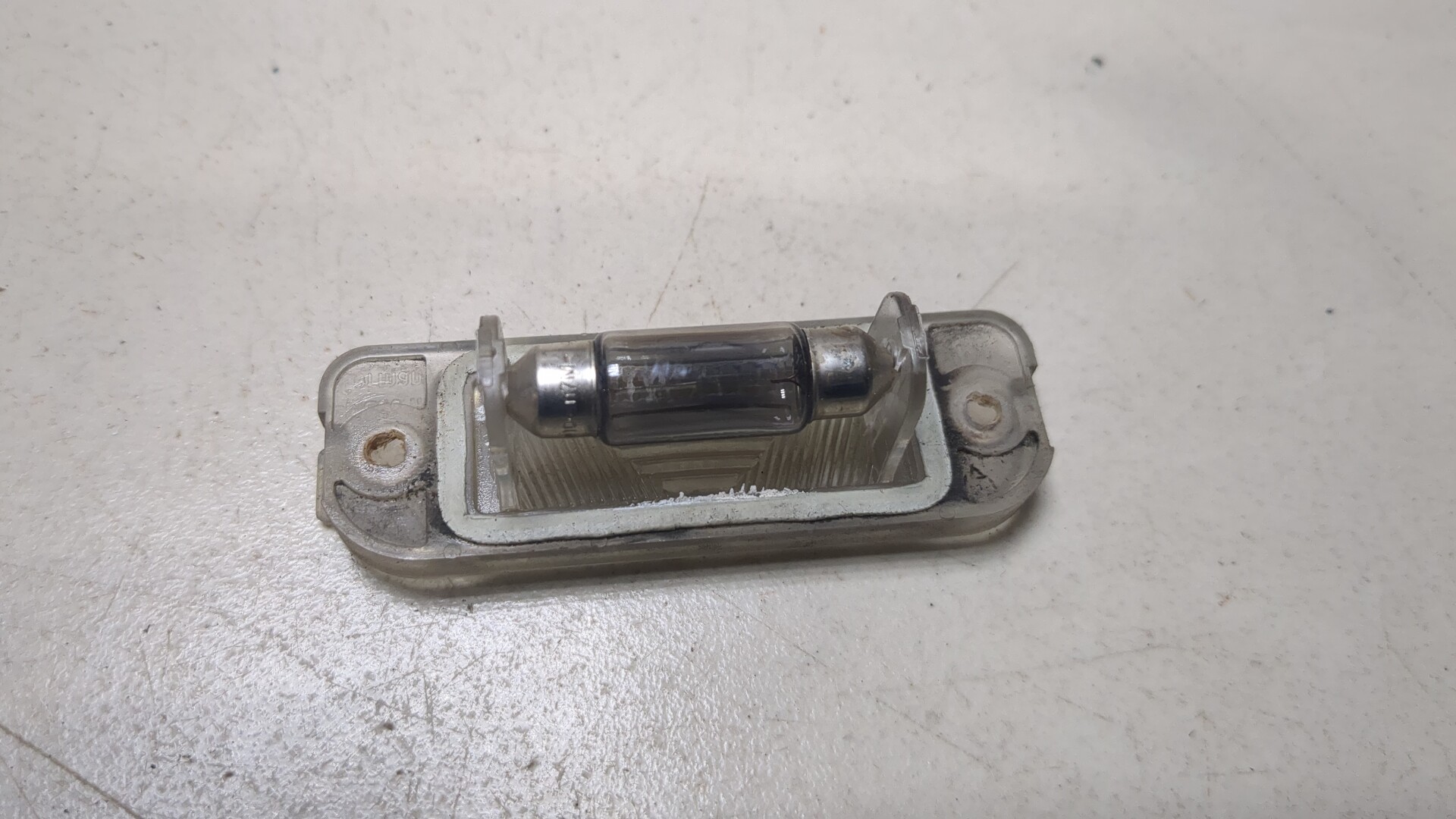 Фонарь подсветки номера