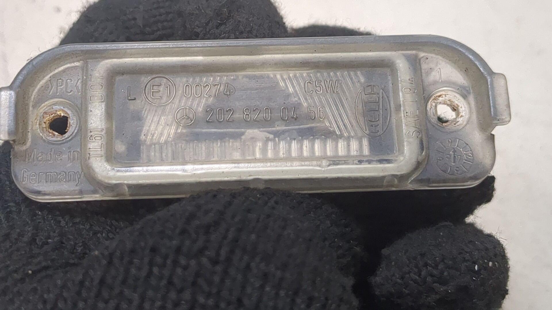 Фонарь подсветки номера