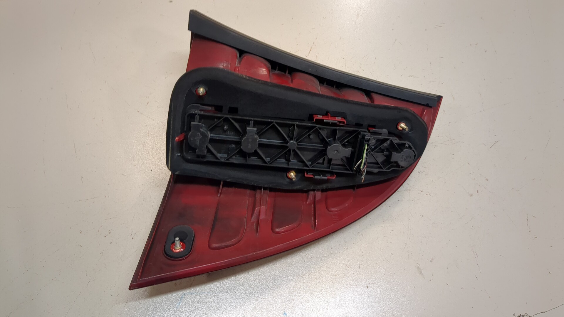 Фонарь задний левый