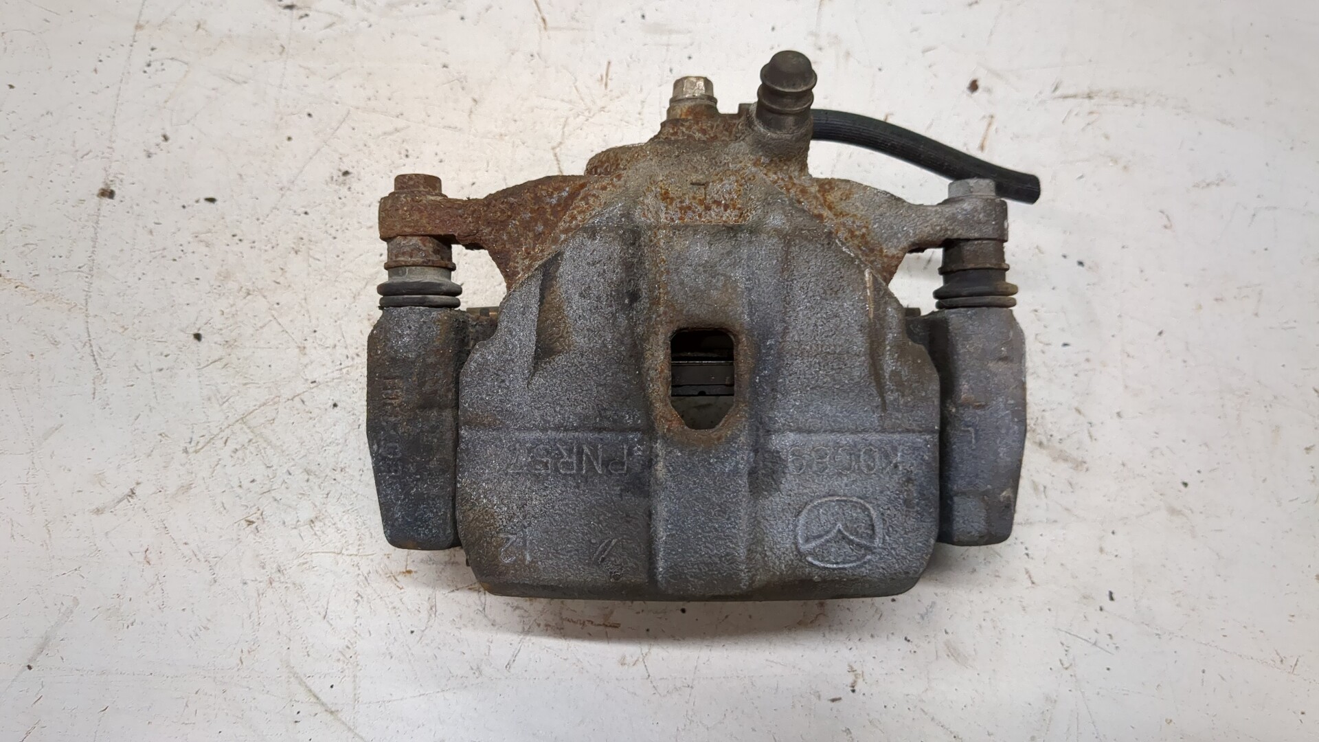 Суппорт передний левый