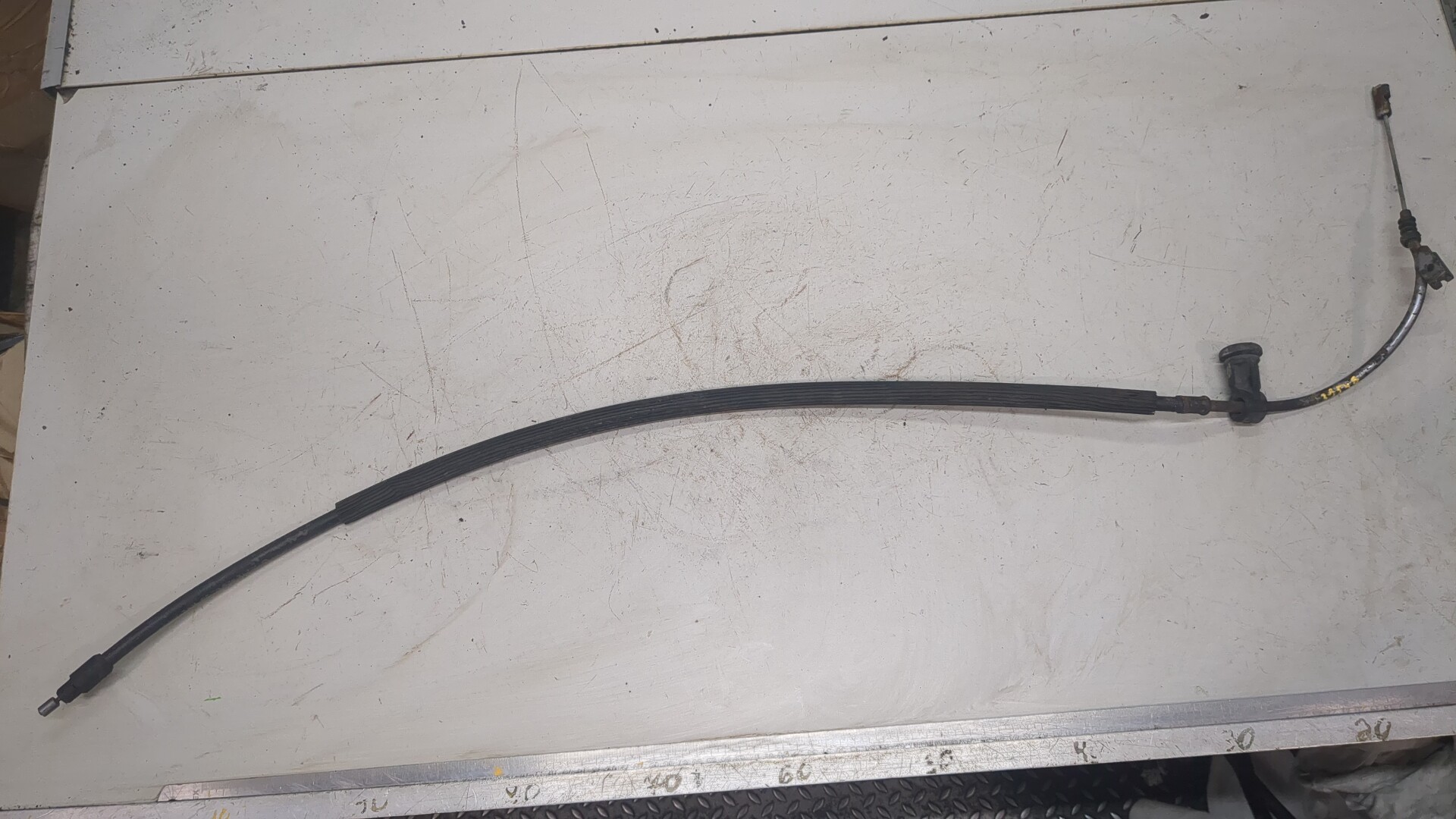 Трос стояночного тормоза