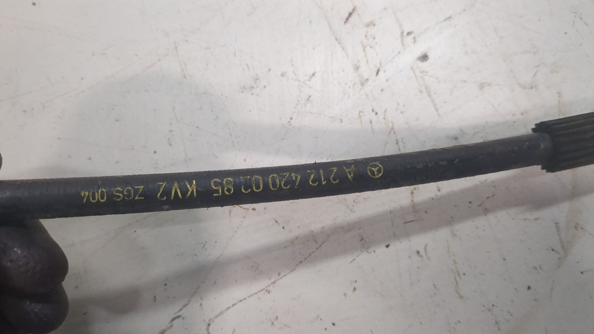 Трос стояночного тормоза