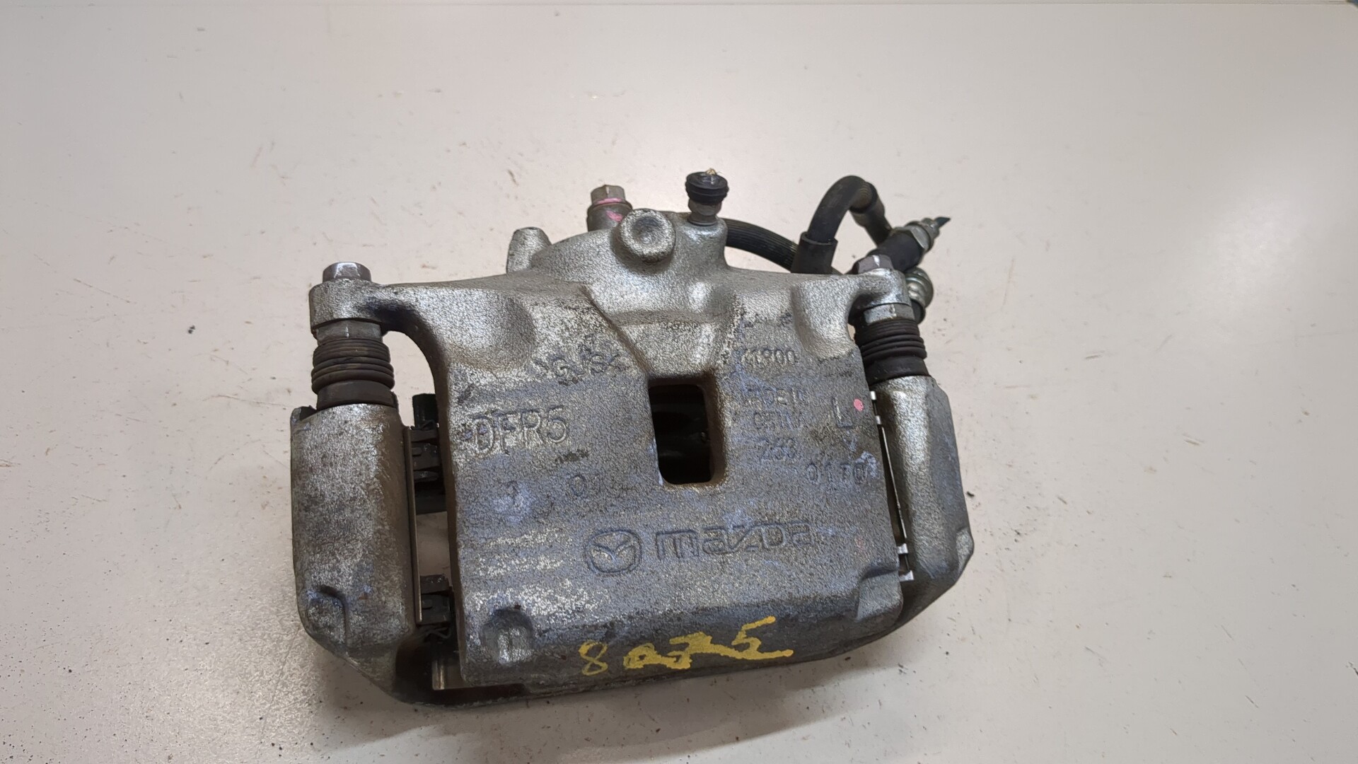 Суппорт передний левый