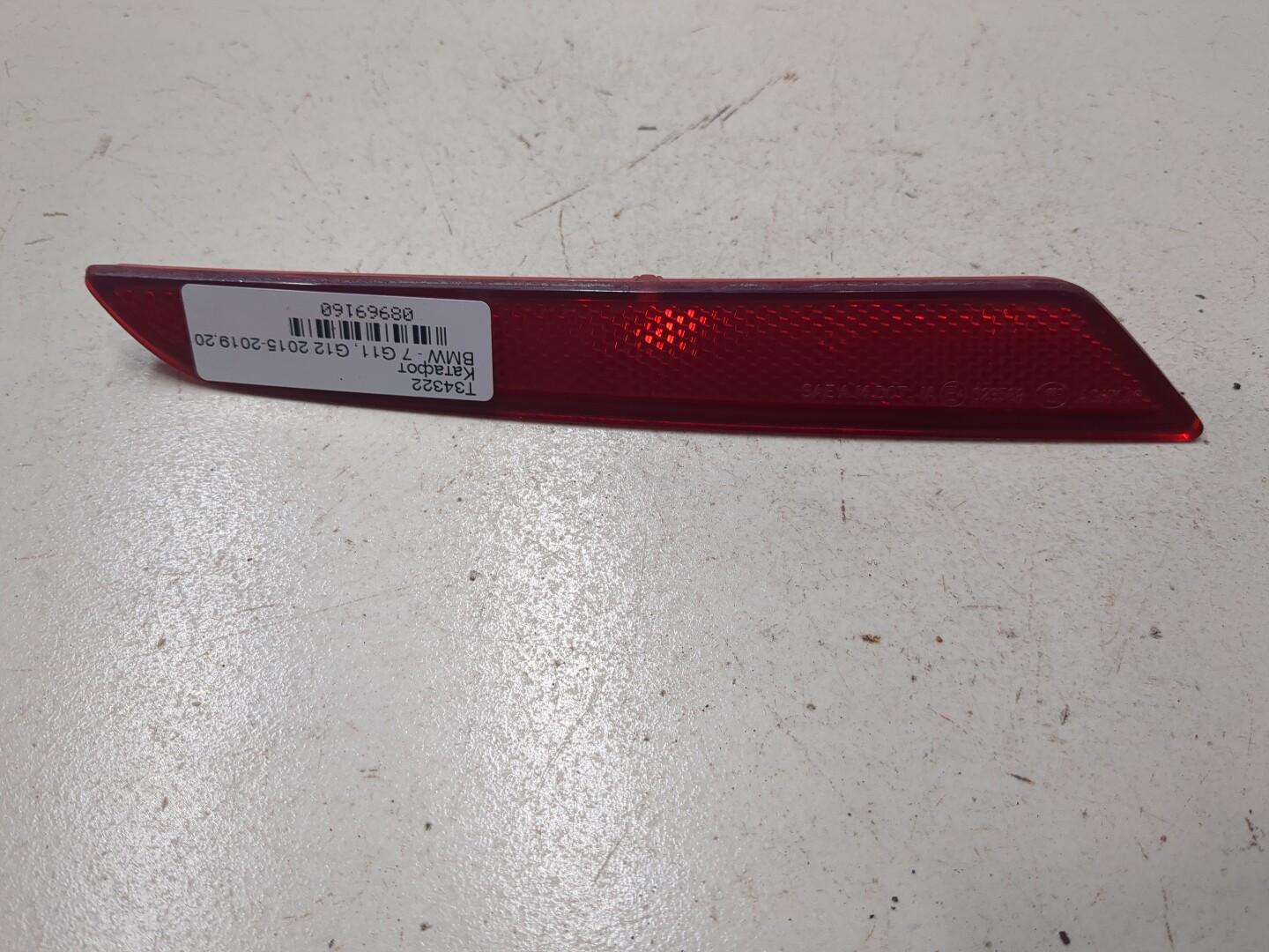 Отражатель в бампер задний левый