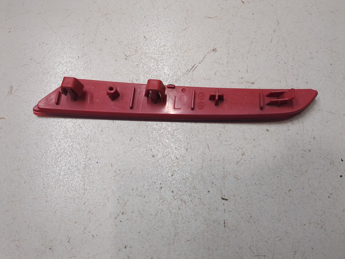 Отражатель в бампер задний левый