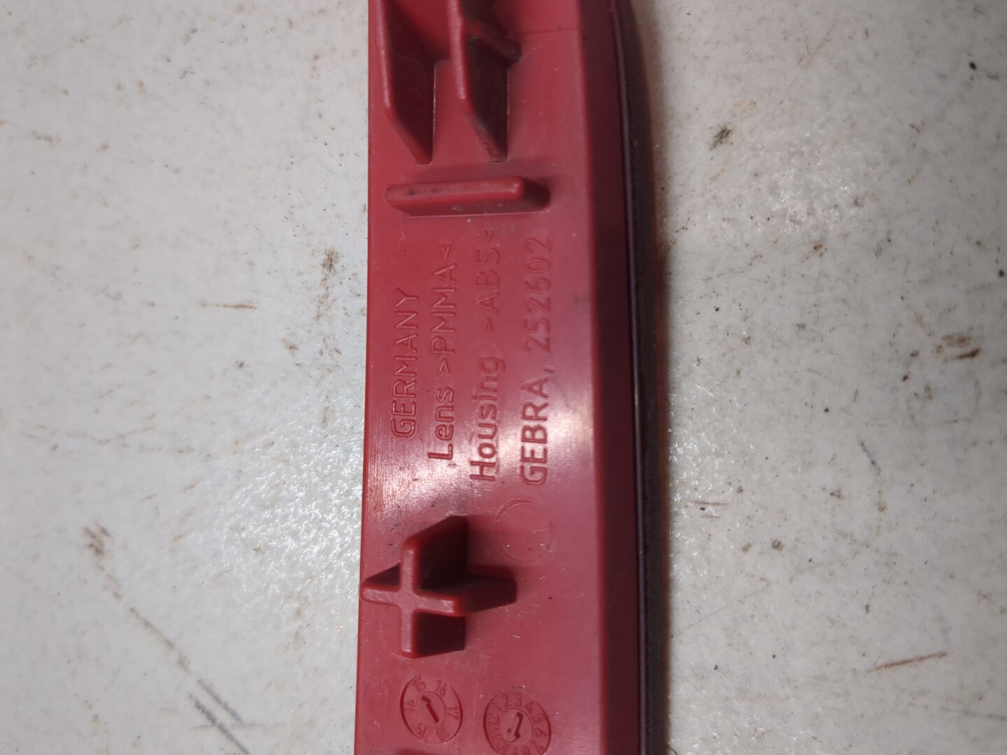 Отражатель в бампер задний левый