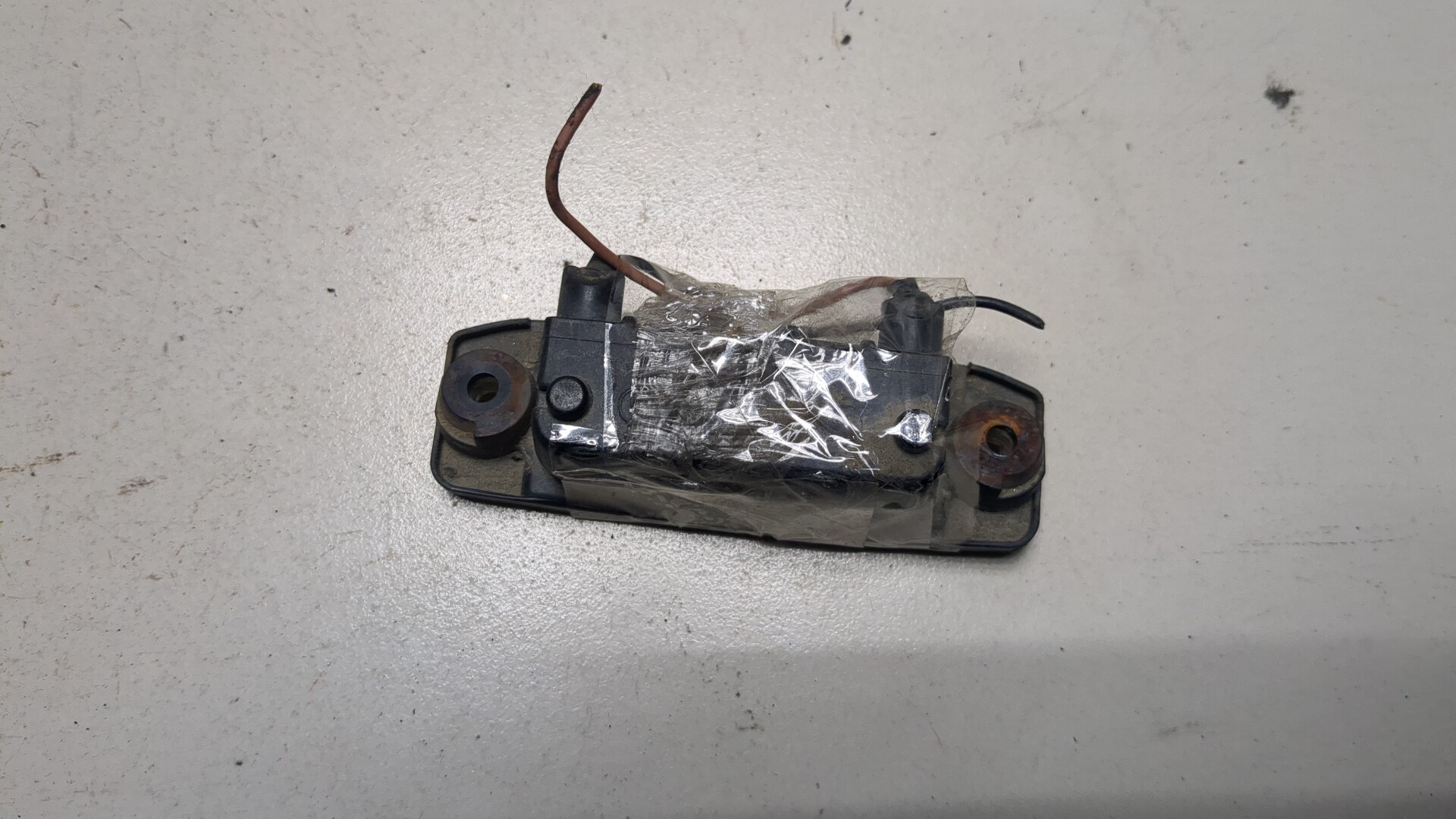 Фонарь подсветки номера