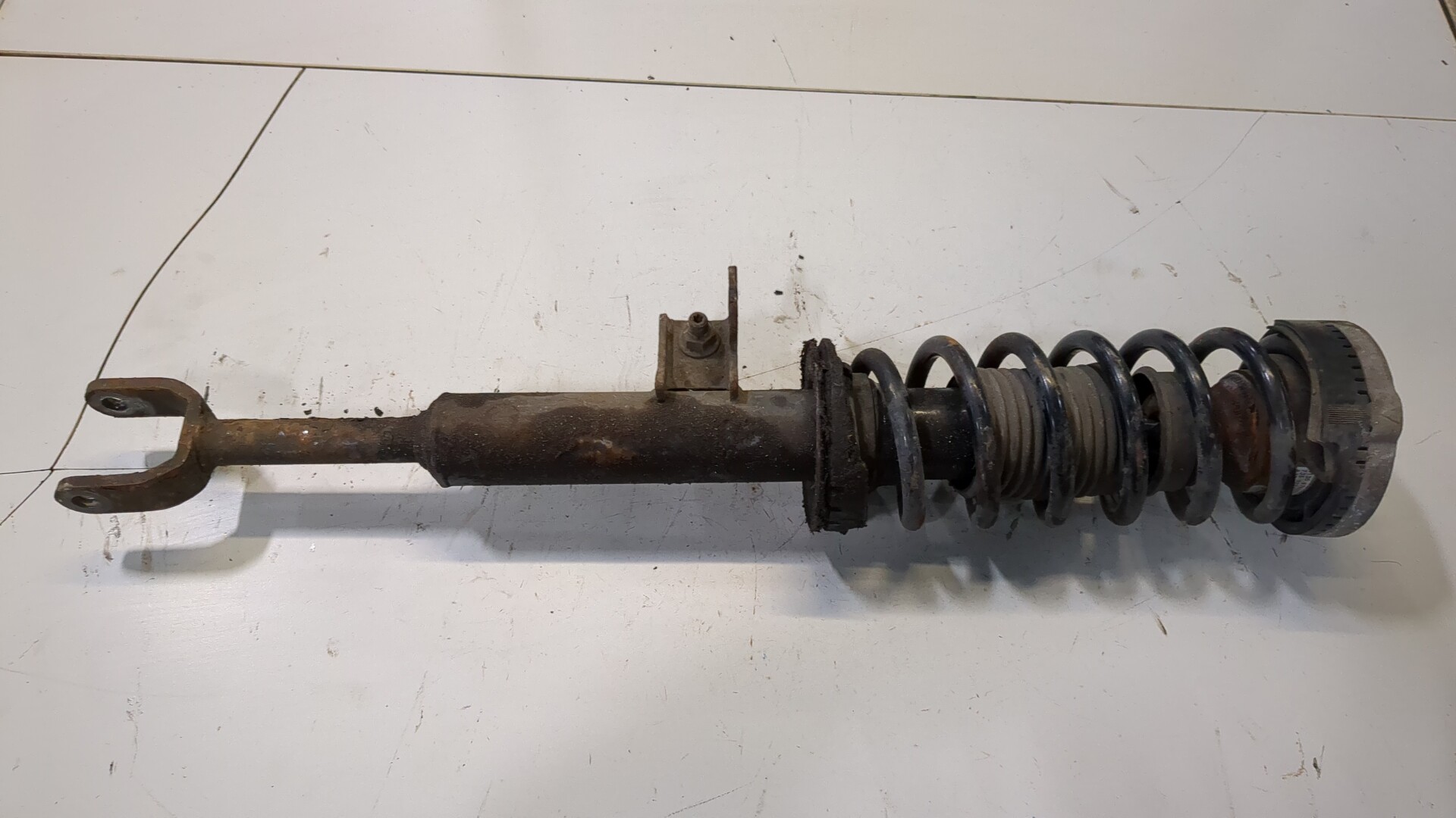 Амортизатор передний левый