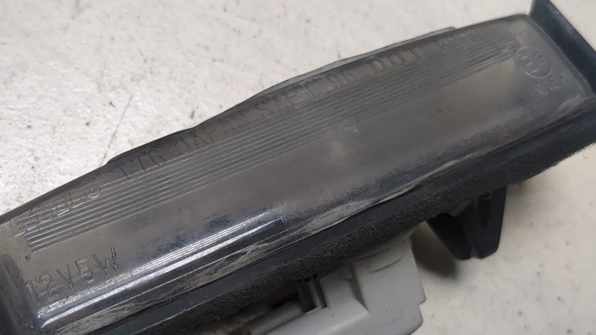 Фонарь подсветки номера