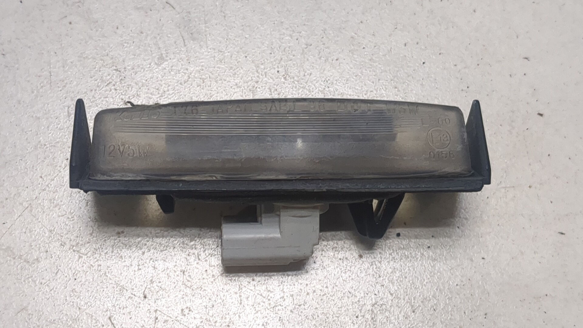 Фонарь подсветки номера