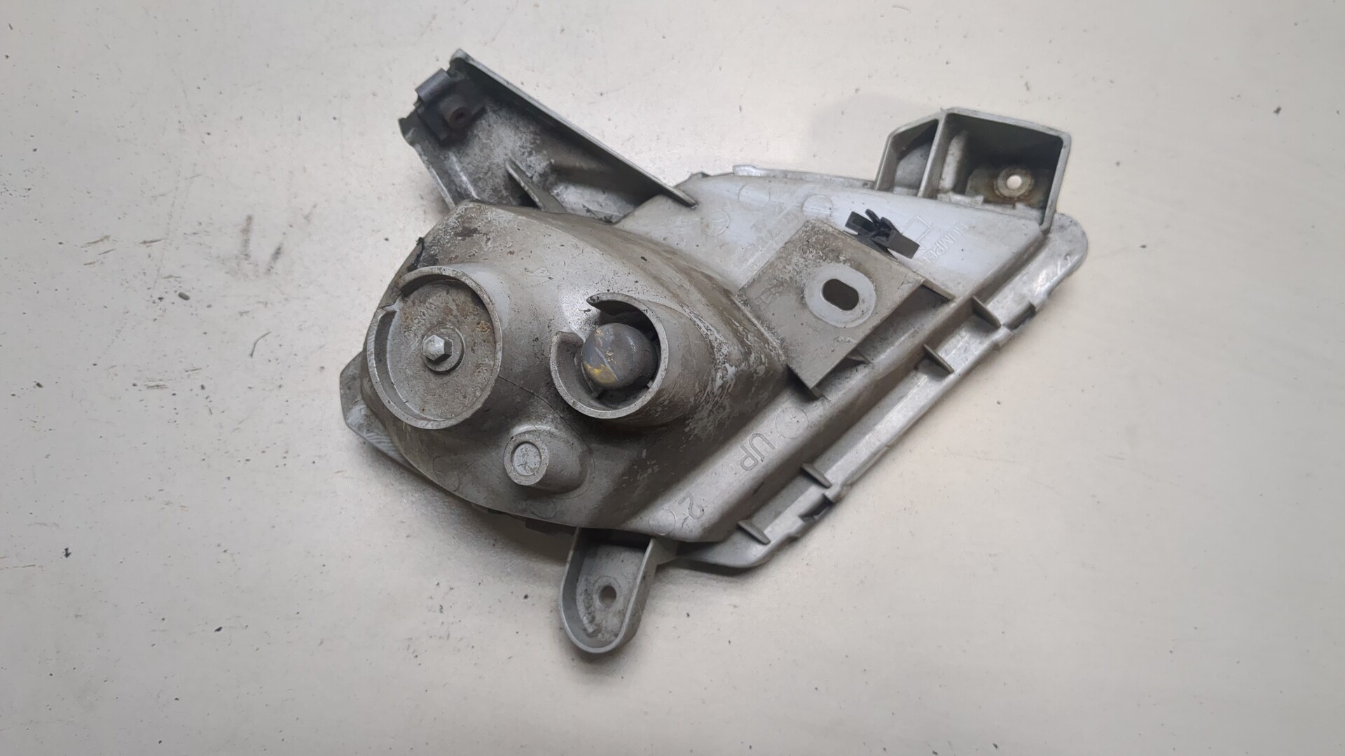 Отражатель в бампер задний левый