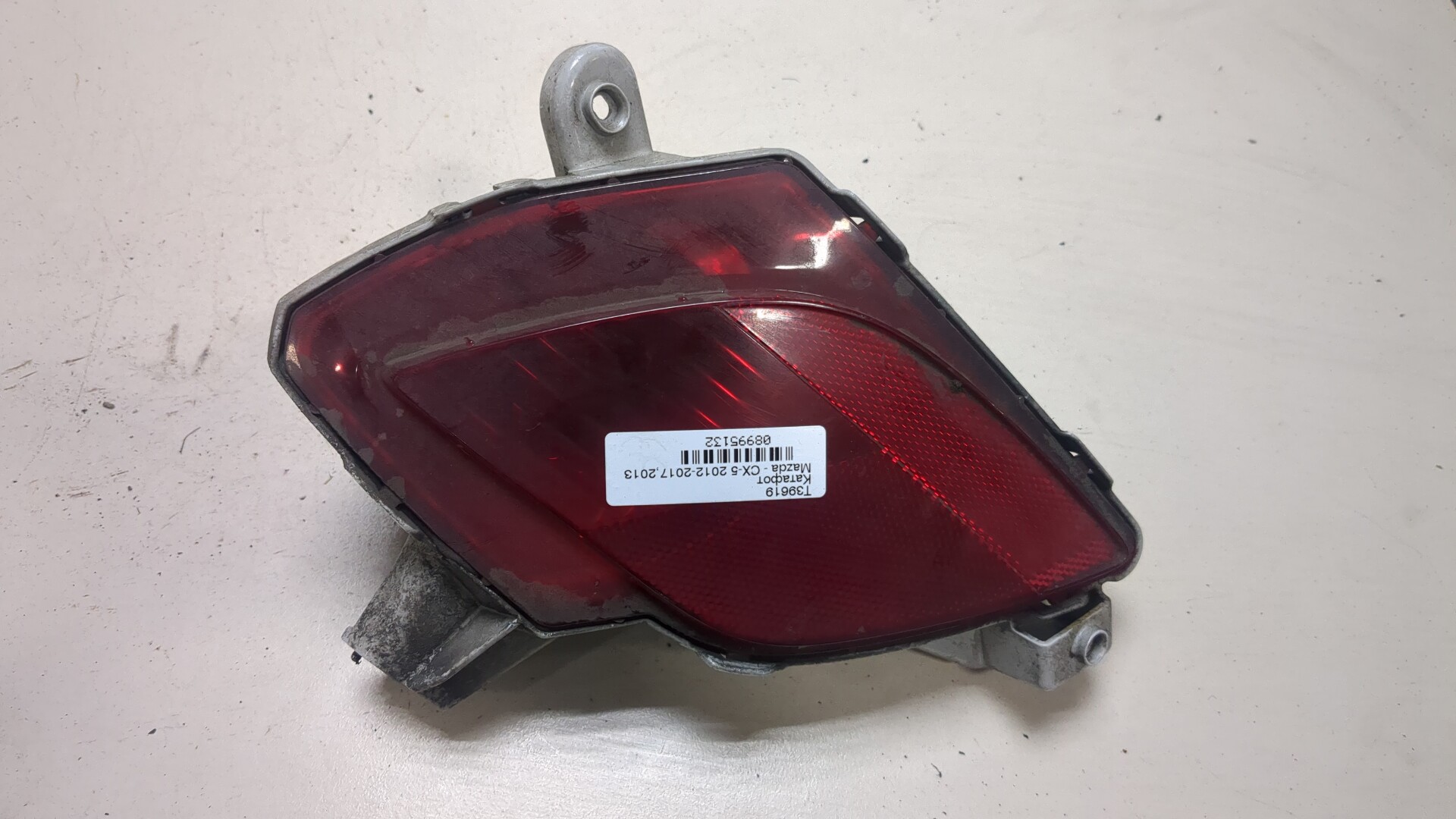 Отражатель в бампер задний левый