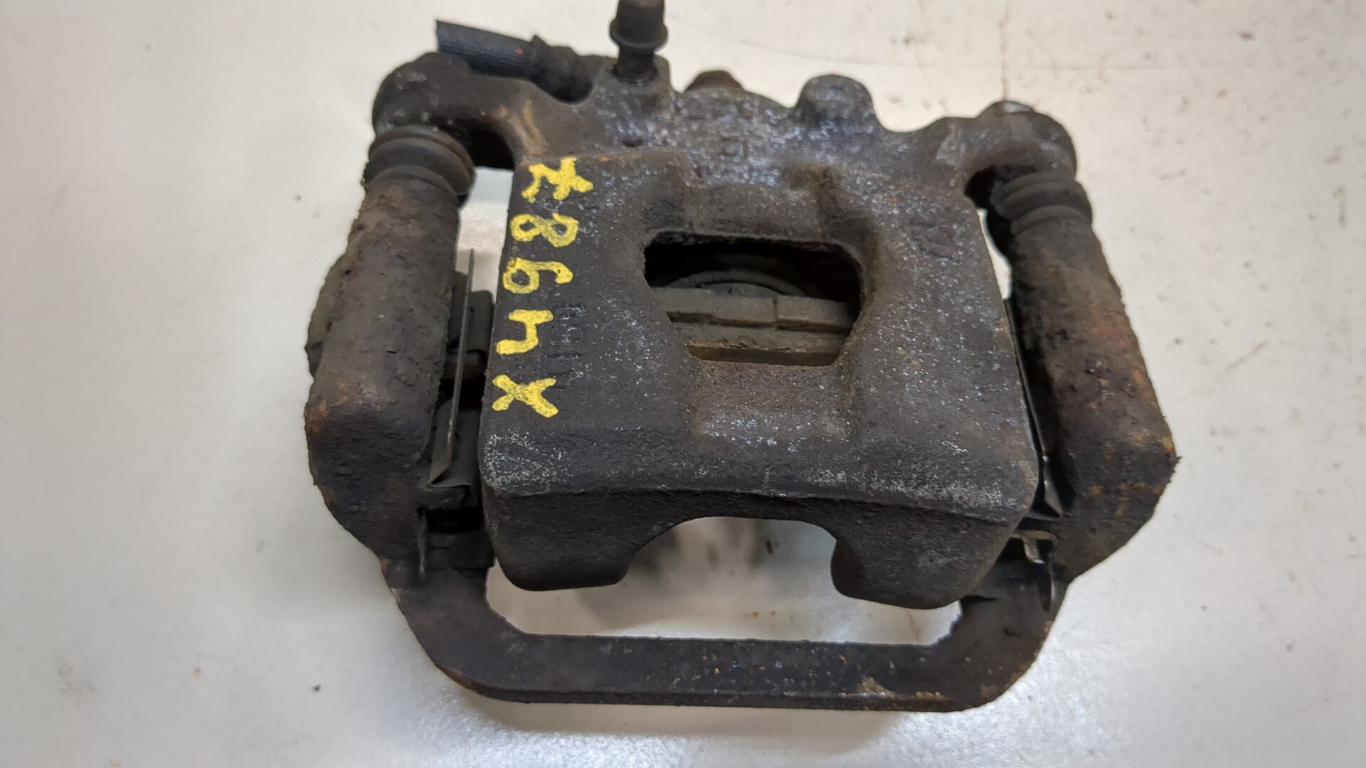 Суппорт задний левый