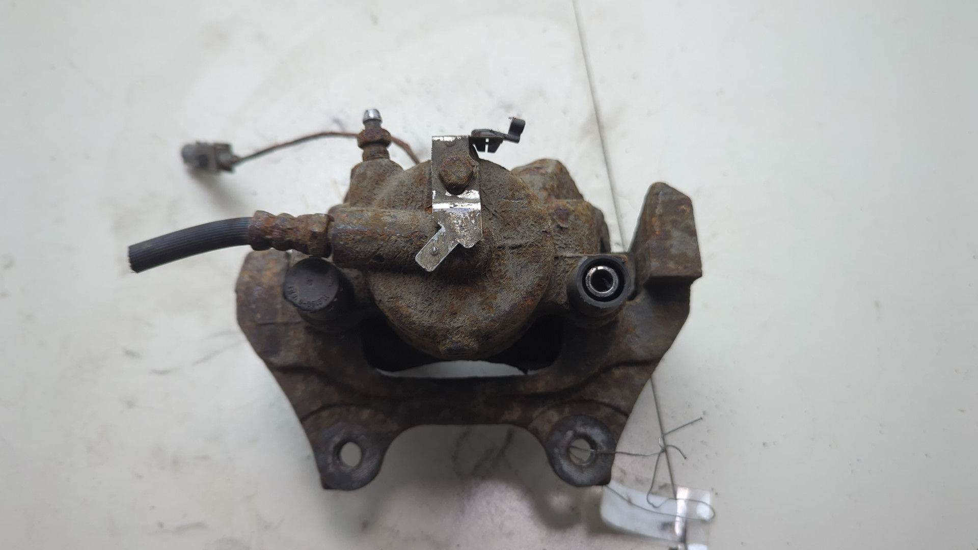 Суппорт передний левый