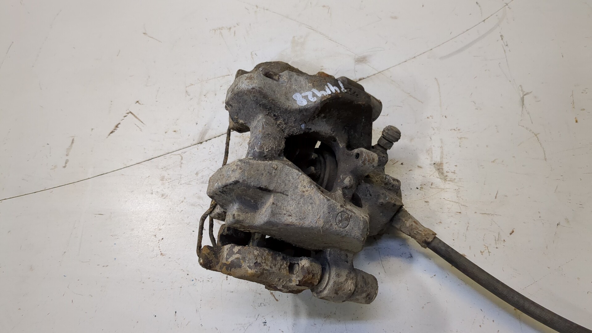 Суппорт задний левый