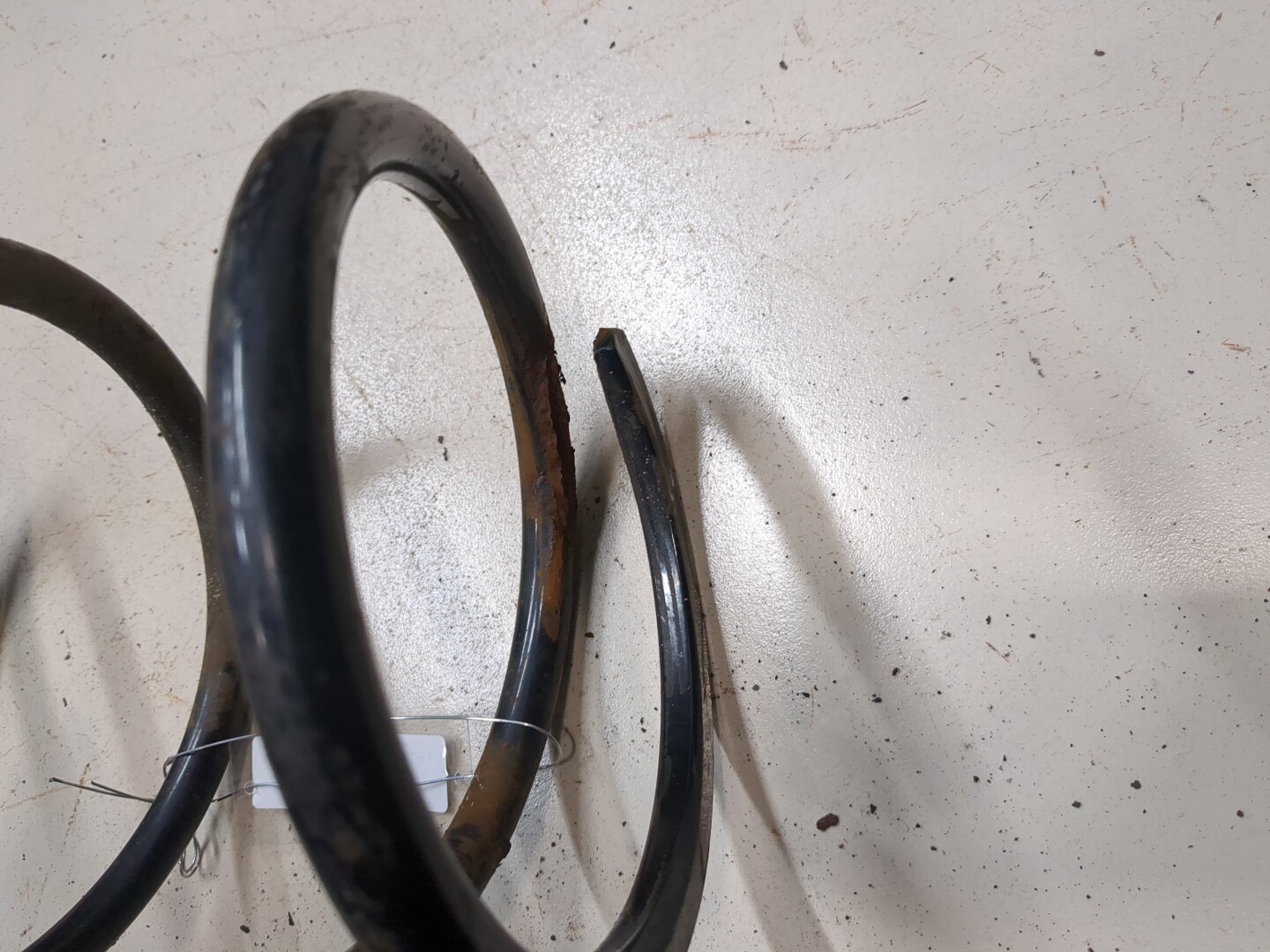 Пружина задняя