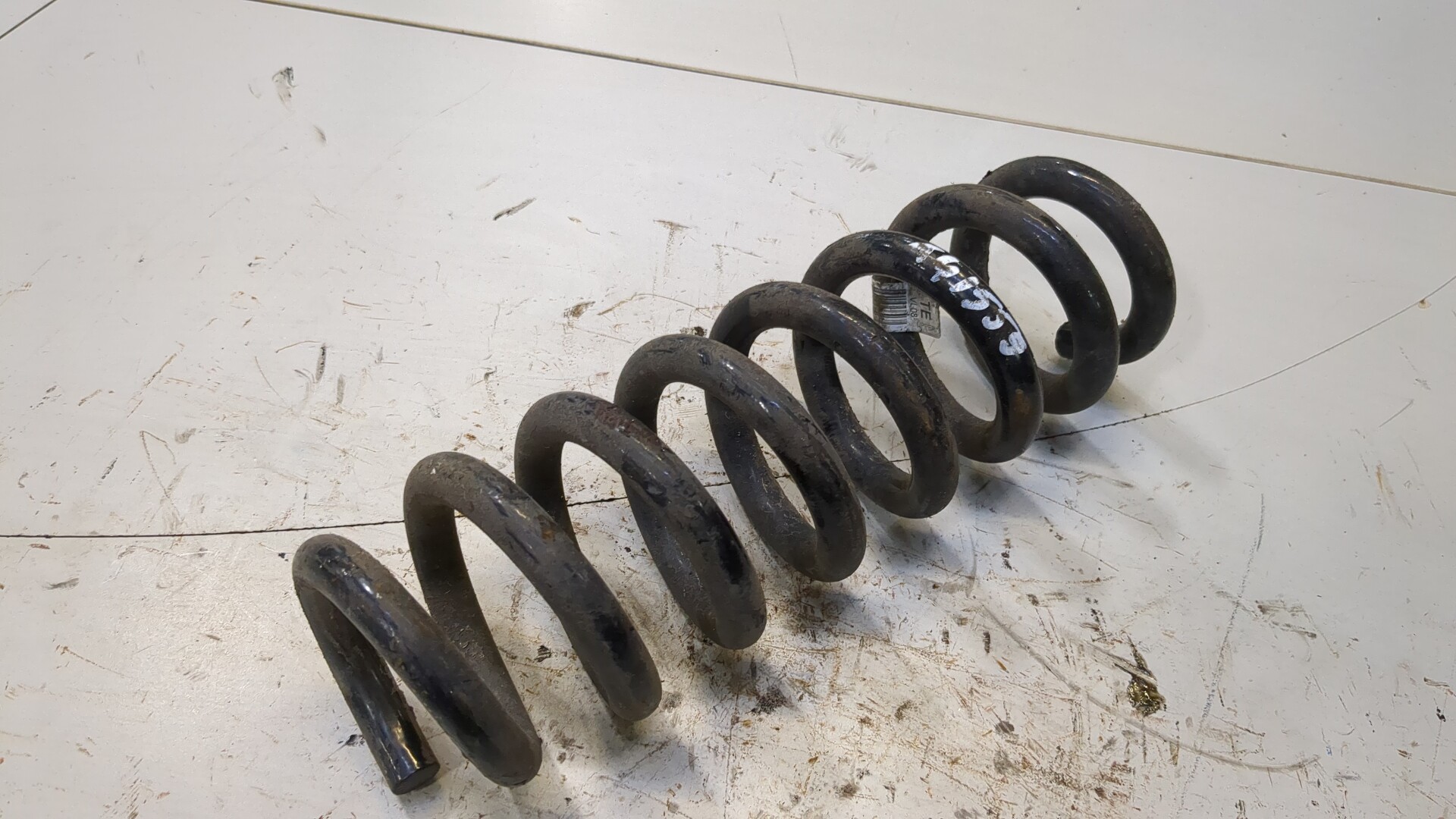 Пружина задняя