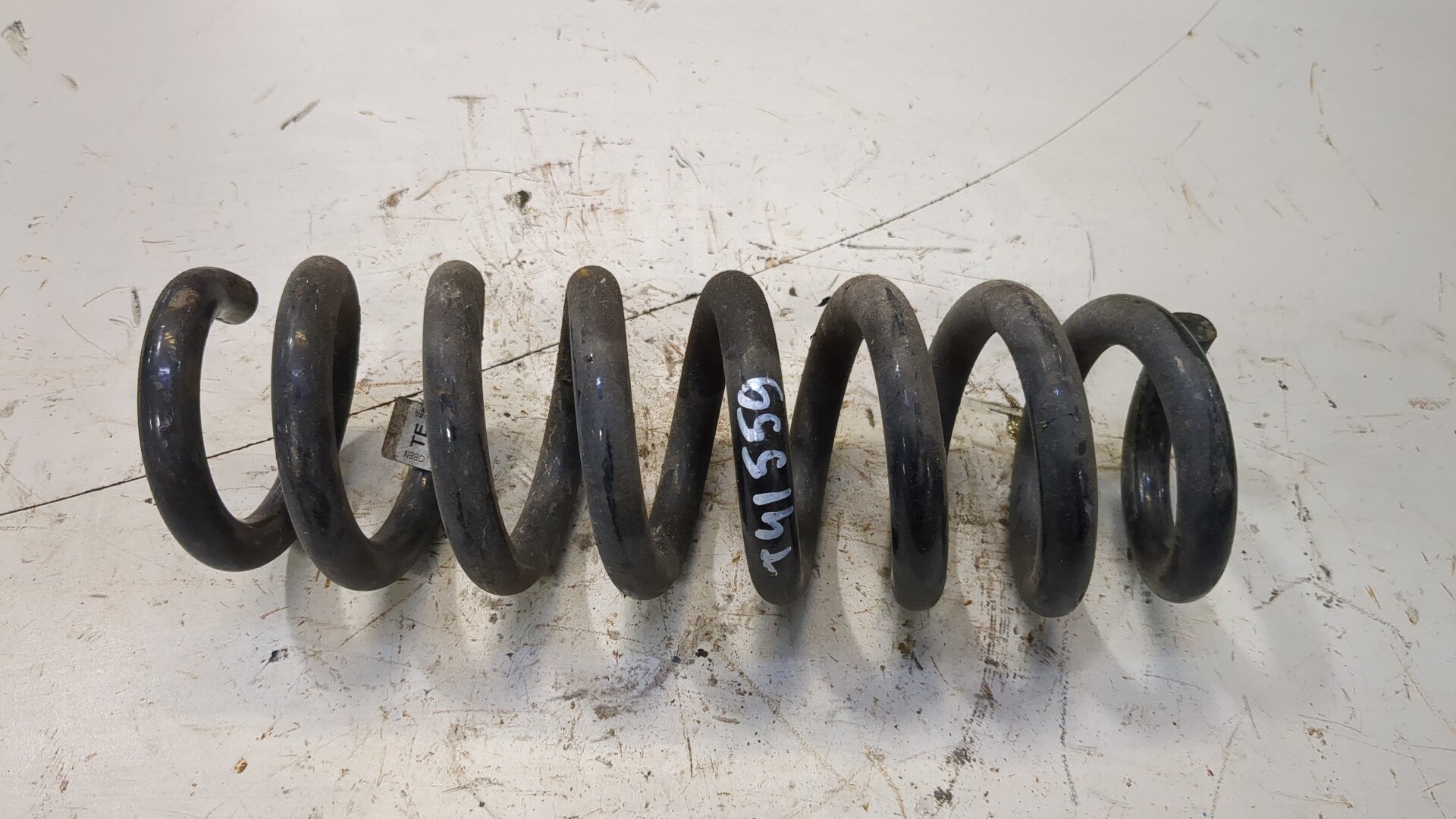 Пружина задняя