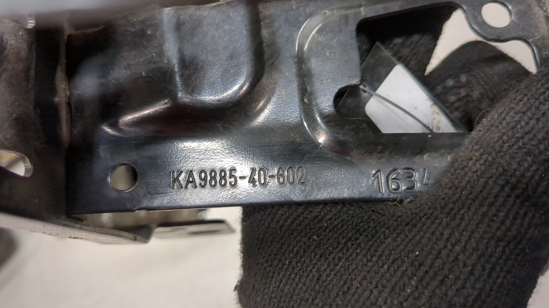 Кронштейн фар левый