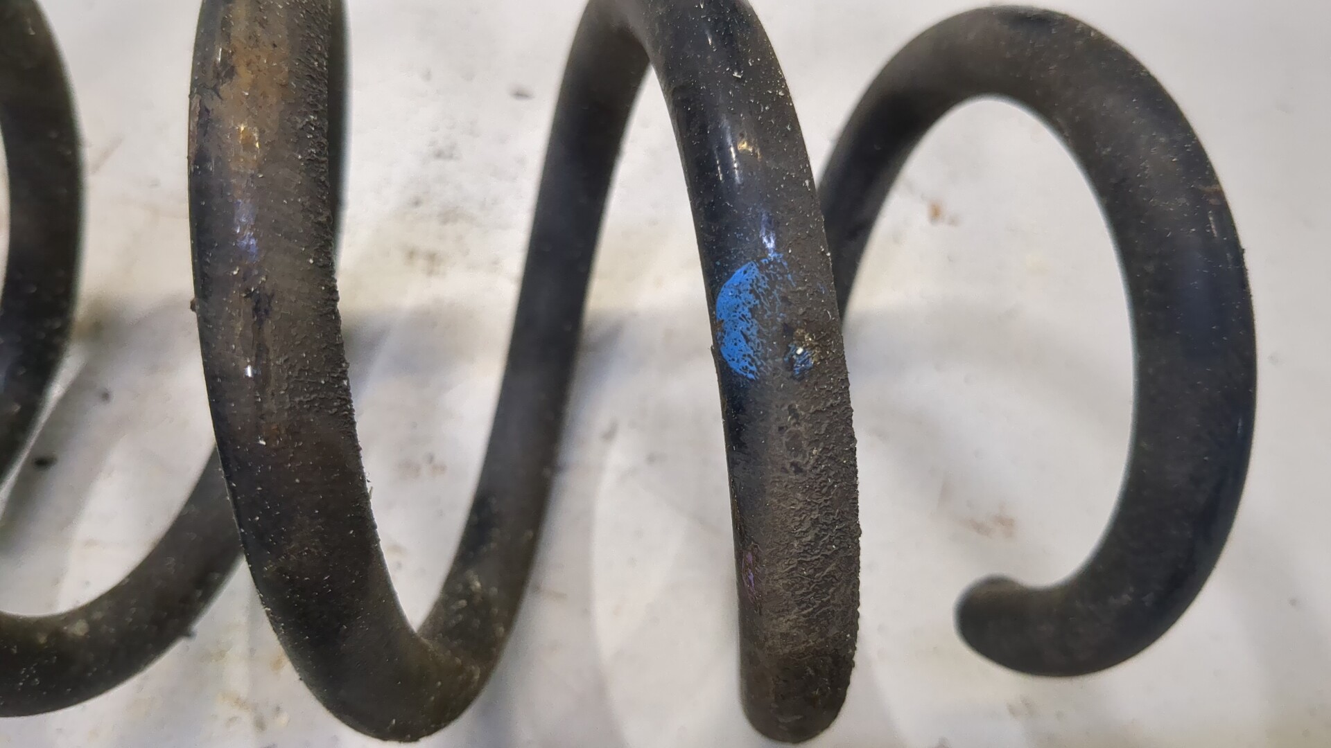 Пружина задняя