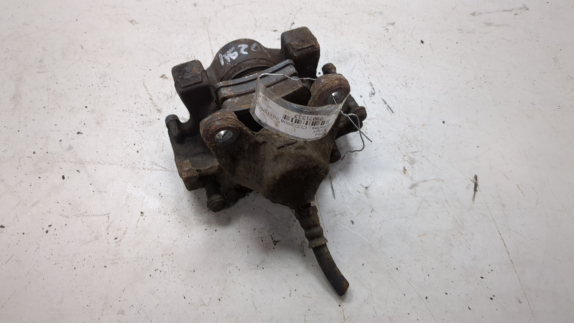 Суппорт задний левый