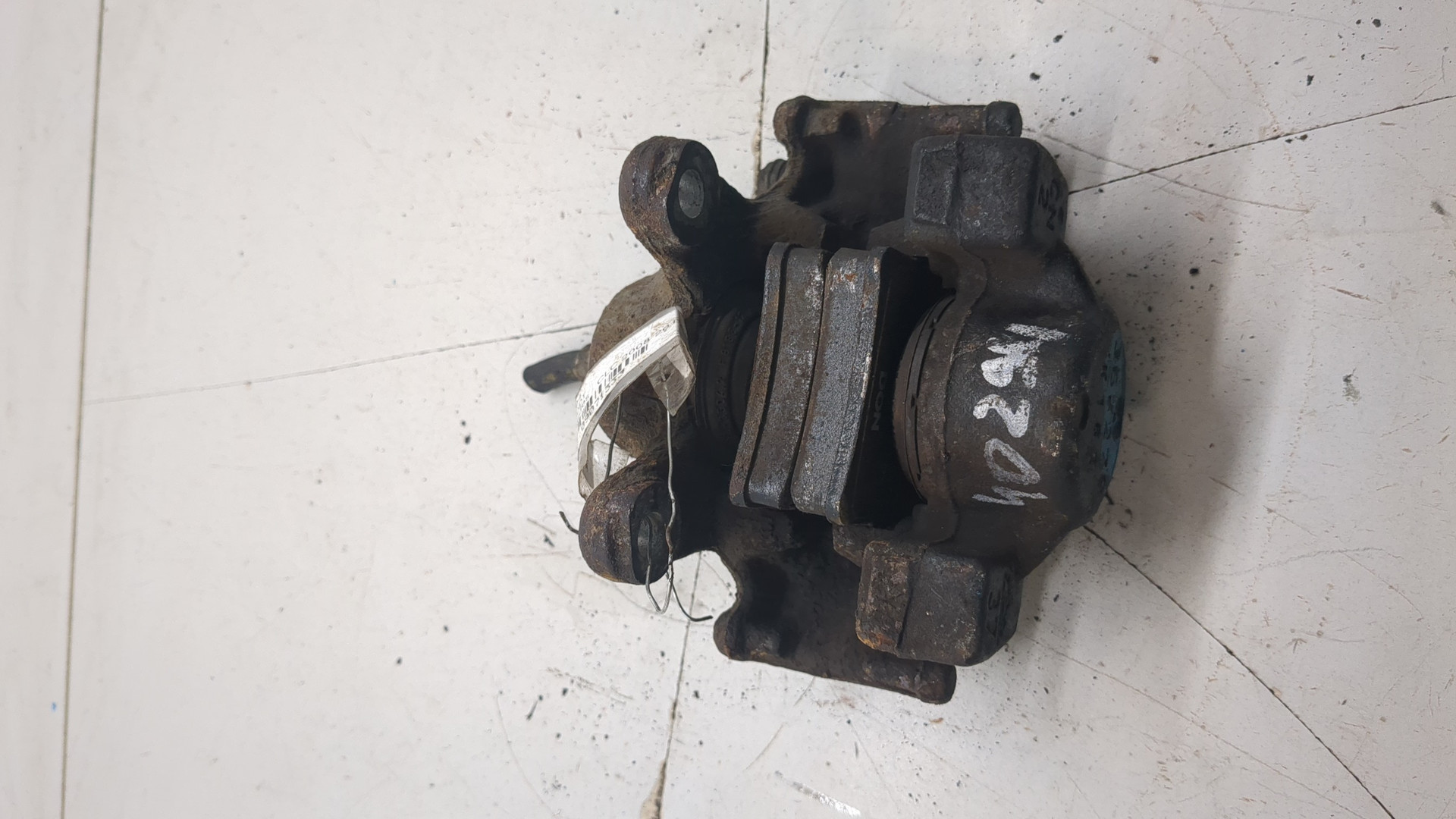 Суппорт задний левый