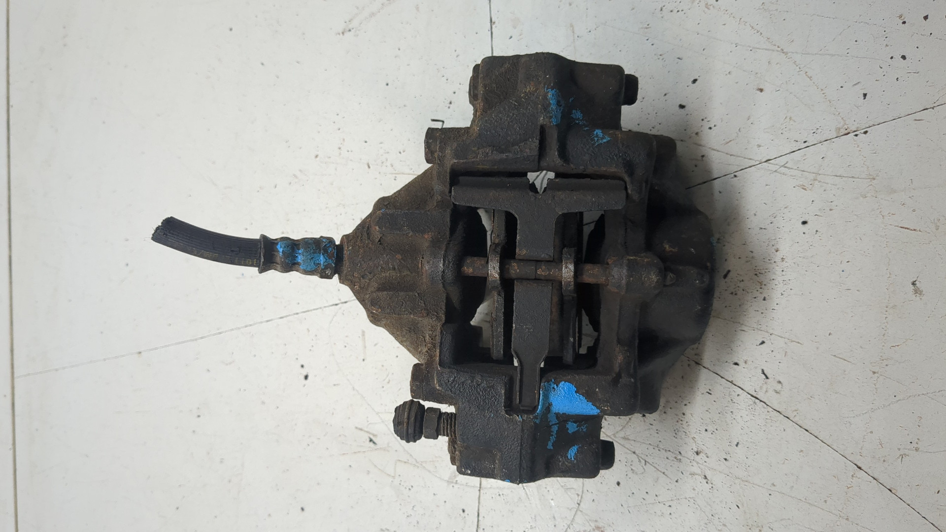 Суппорт задний левый