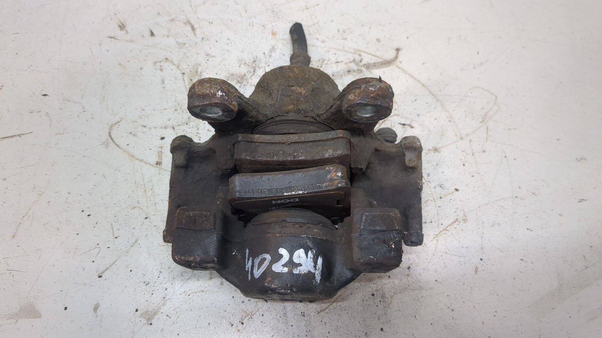 Суппорт задний левый