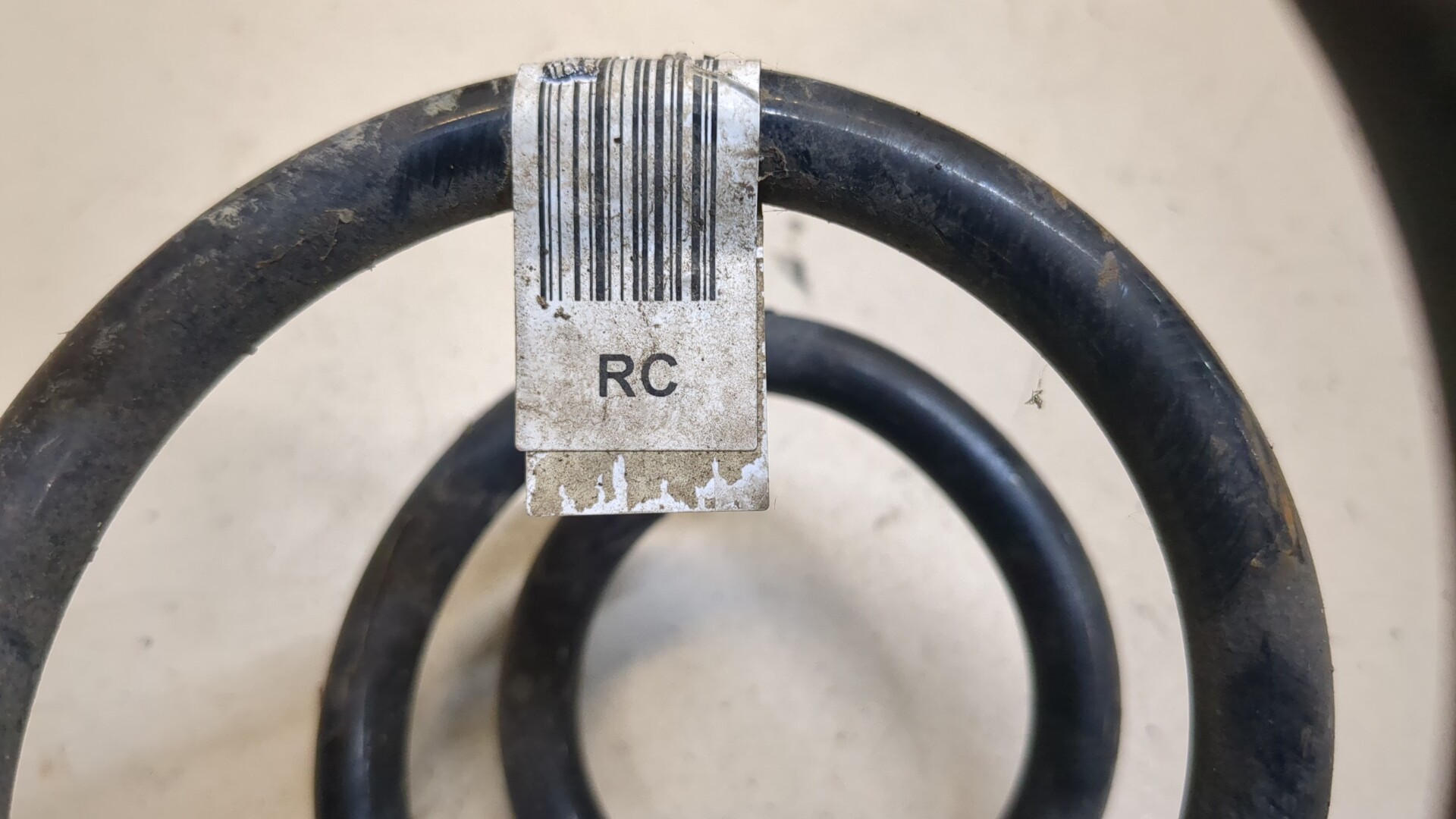 Пружина задняя