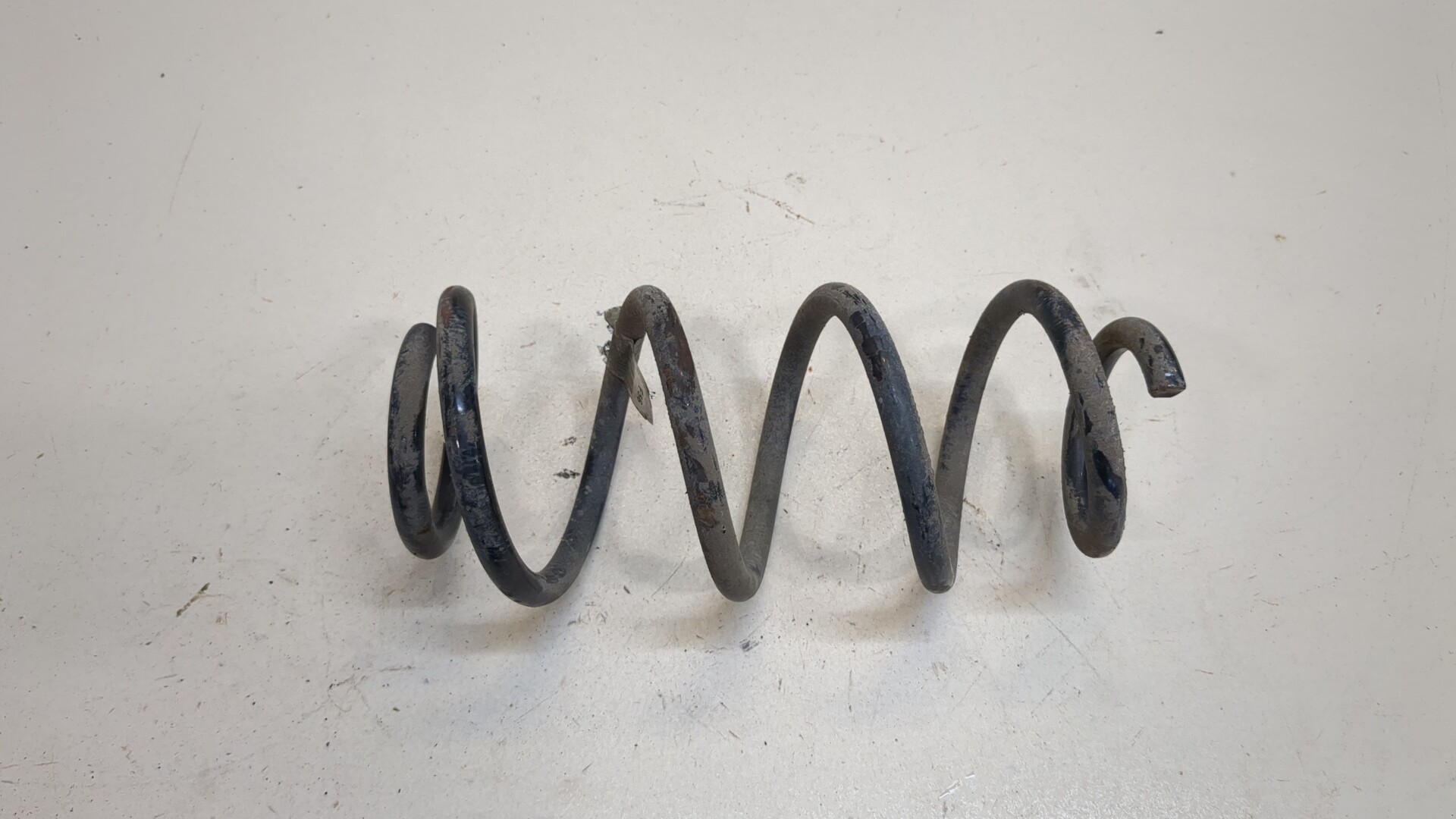 Пружина задняя