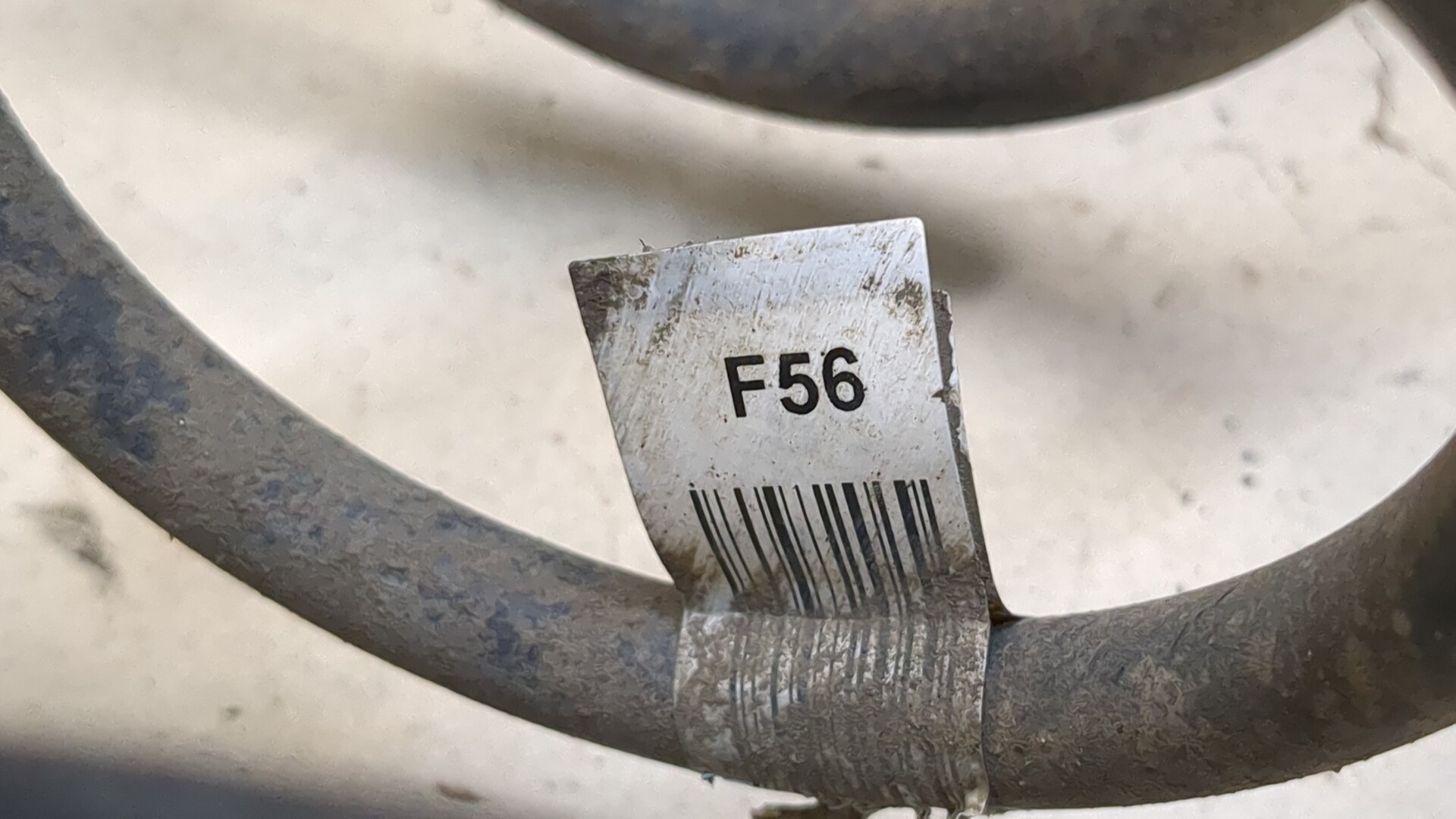 Пружина задняя