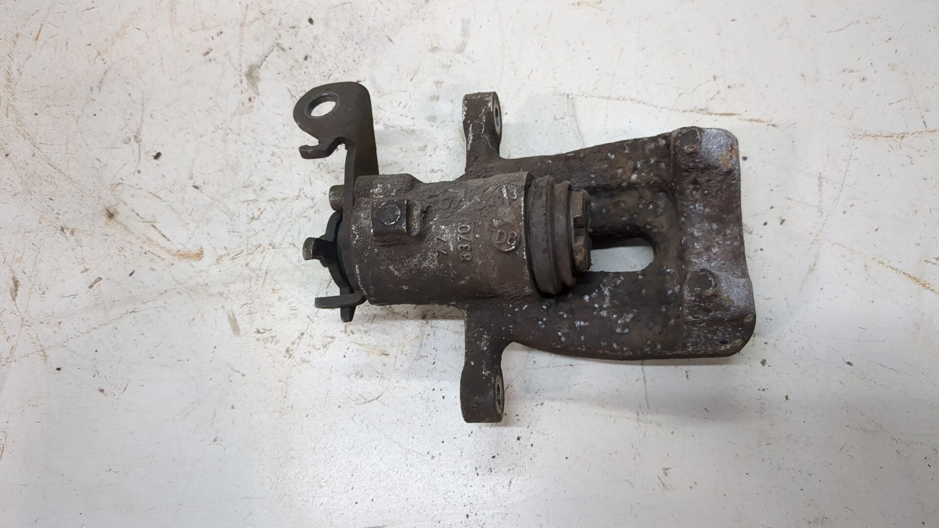 Суппорт задний левый