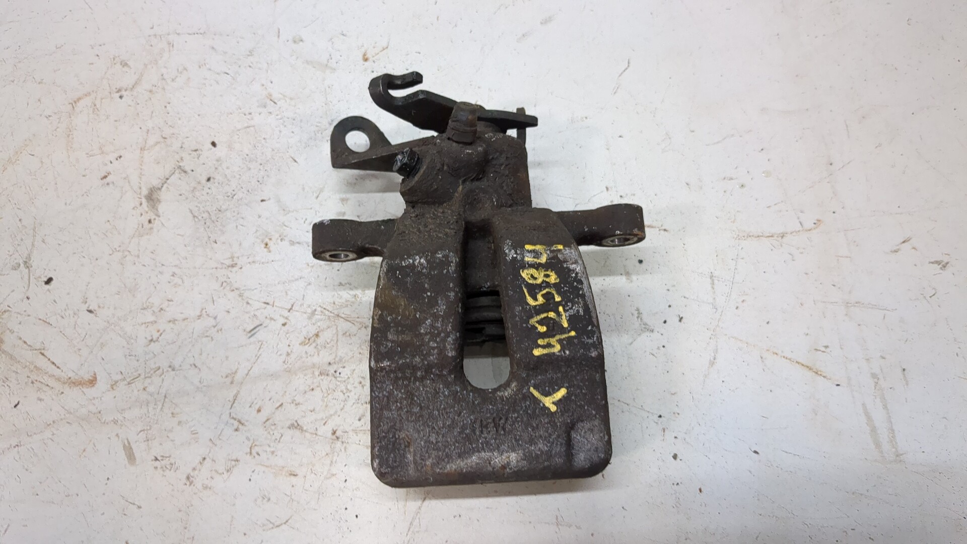 Суппорт задний левый