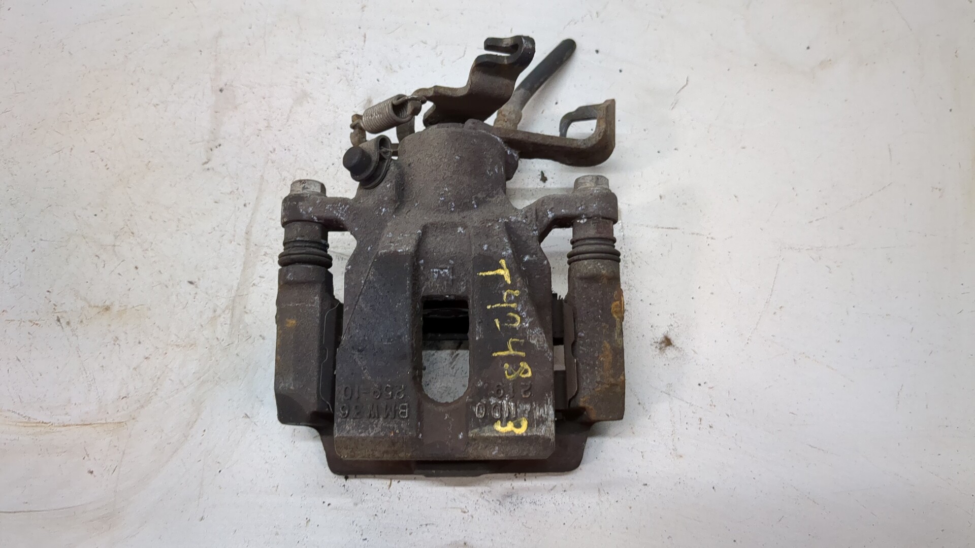 Суппорт задний левый