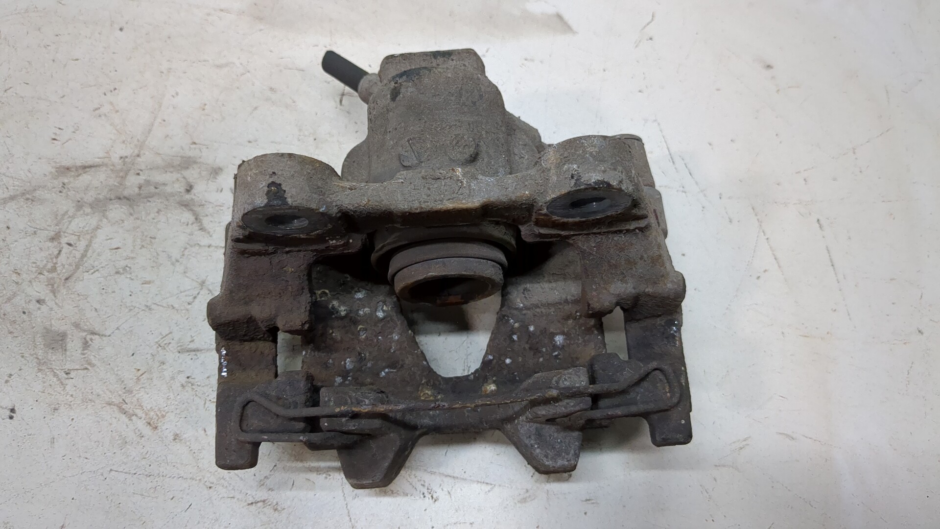 Суппорт задний левый