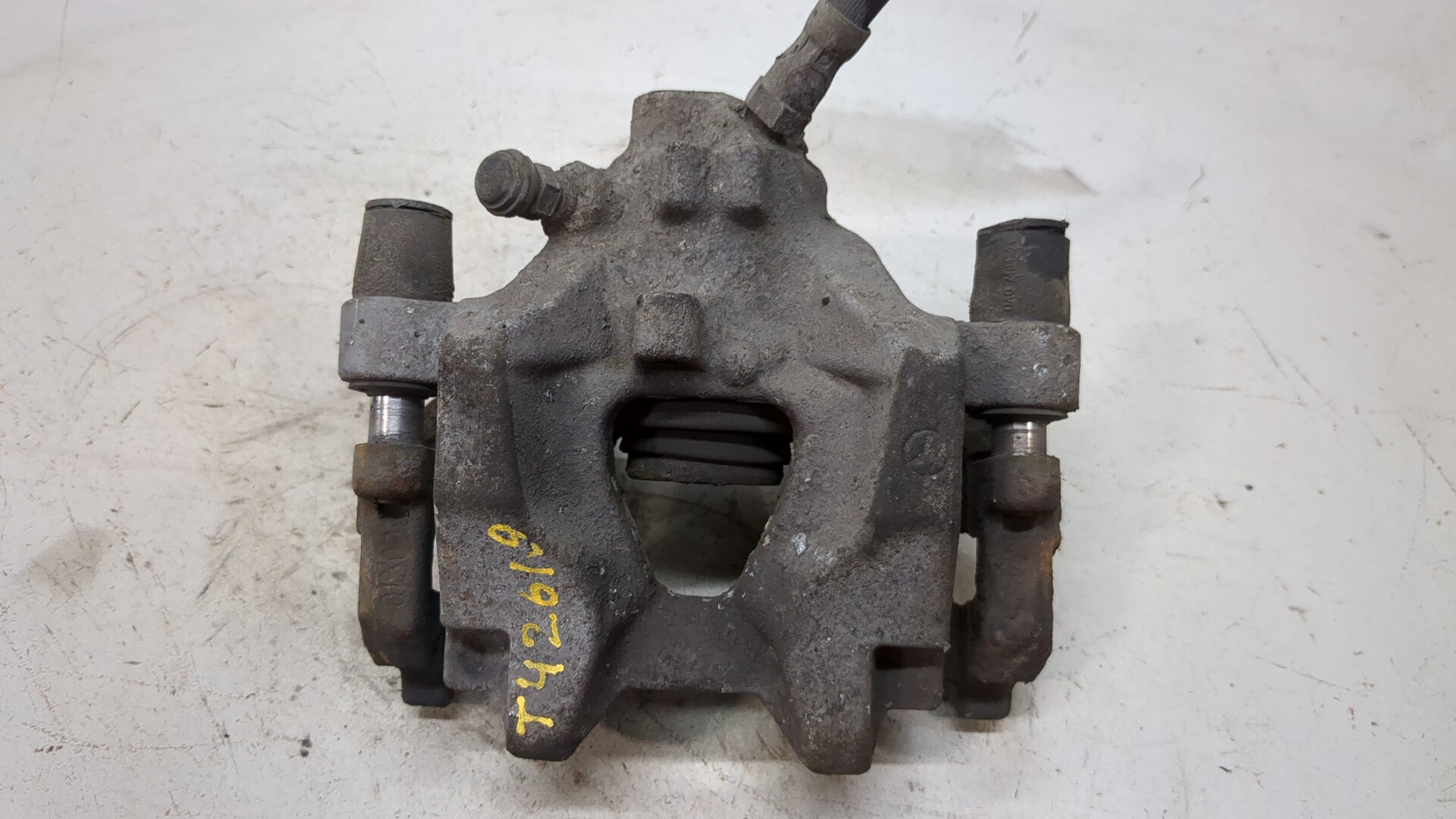 Суппорт задний левый