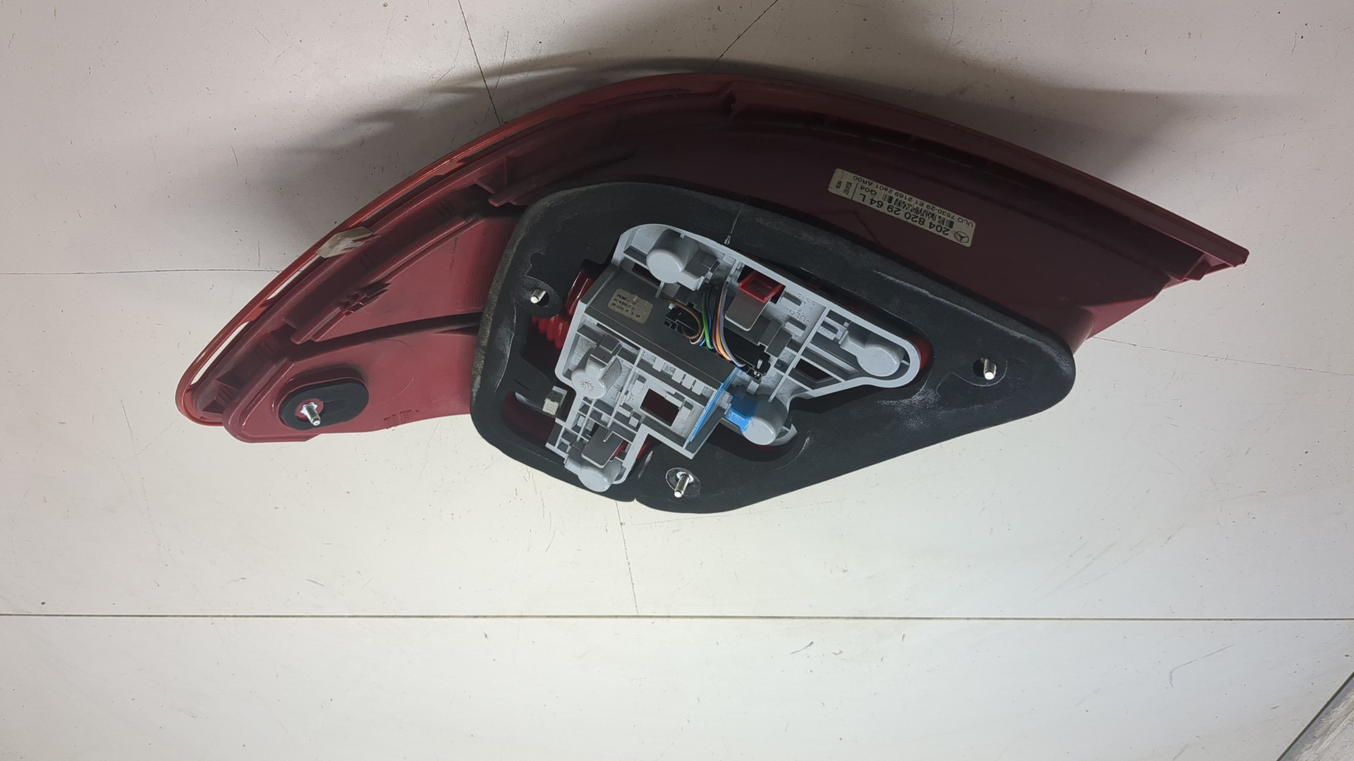 Фонарь задний левый