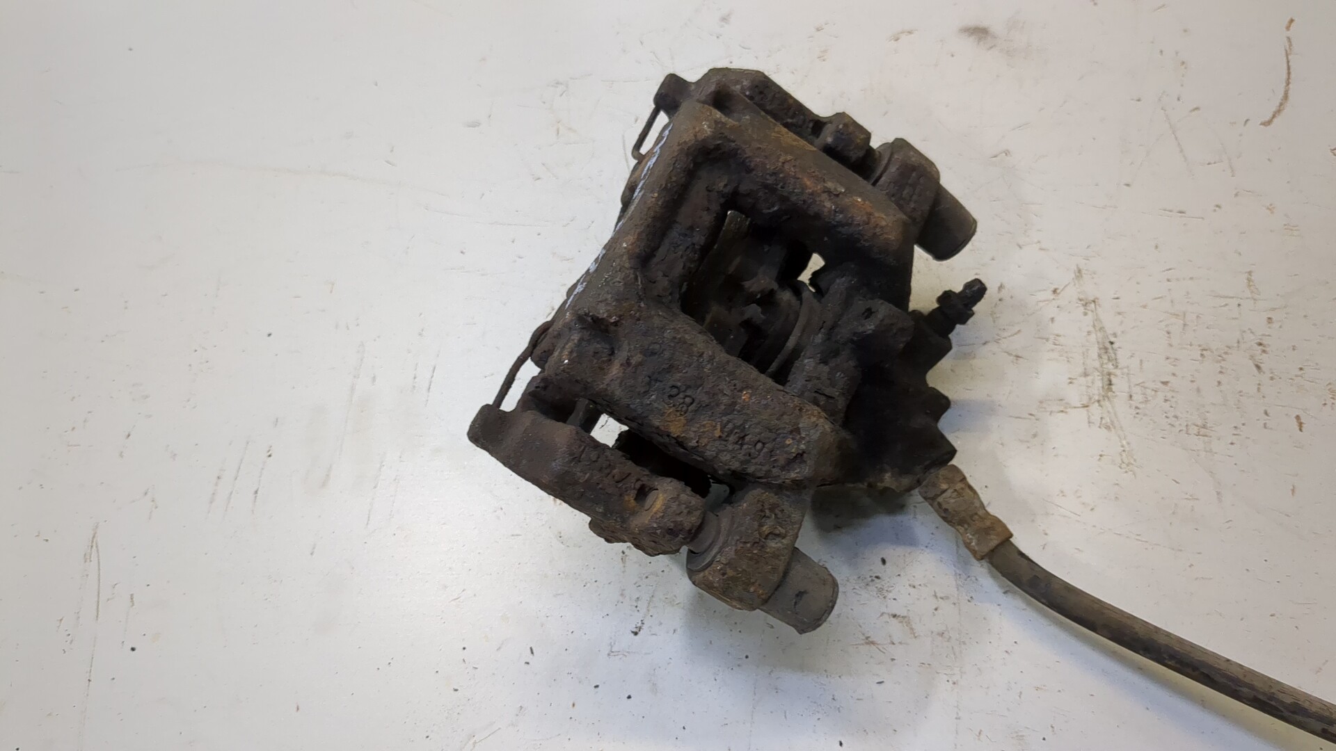 Суппорт задний левый