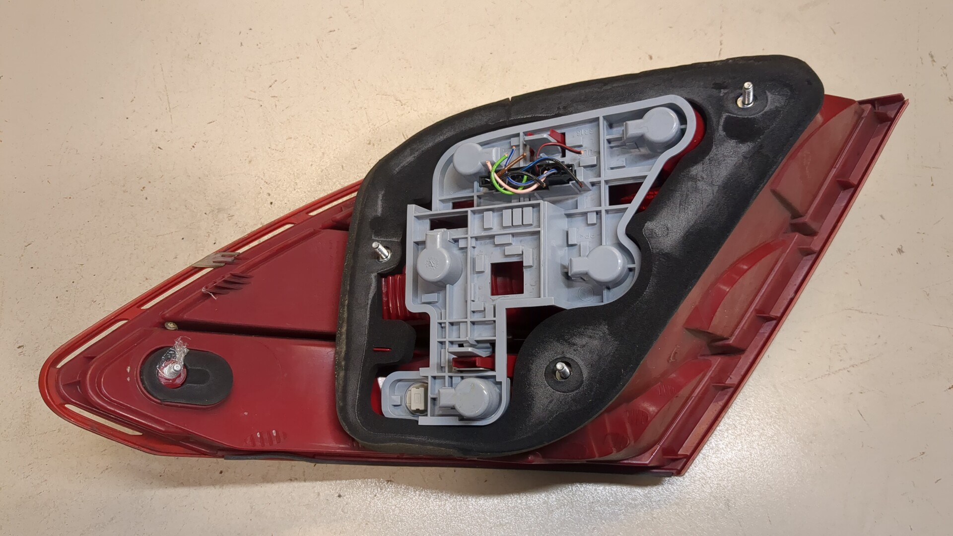 Фонарь задний левый