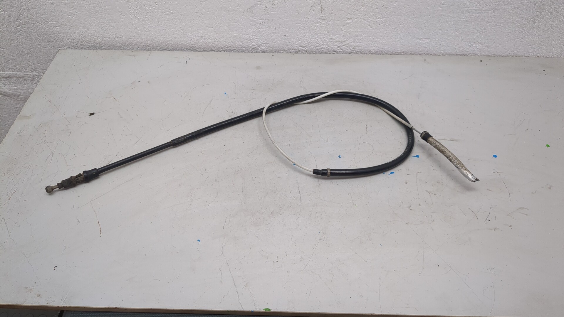 Трос стояночного тормоза