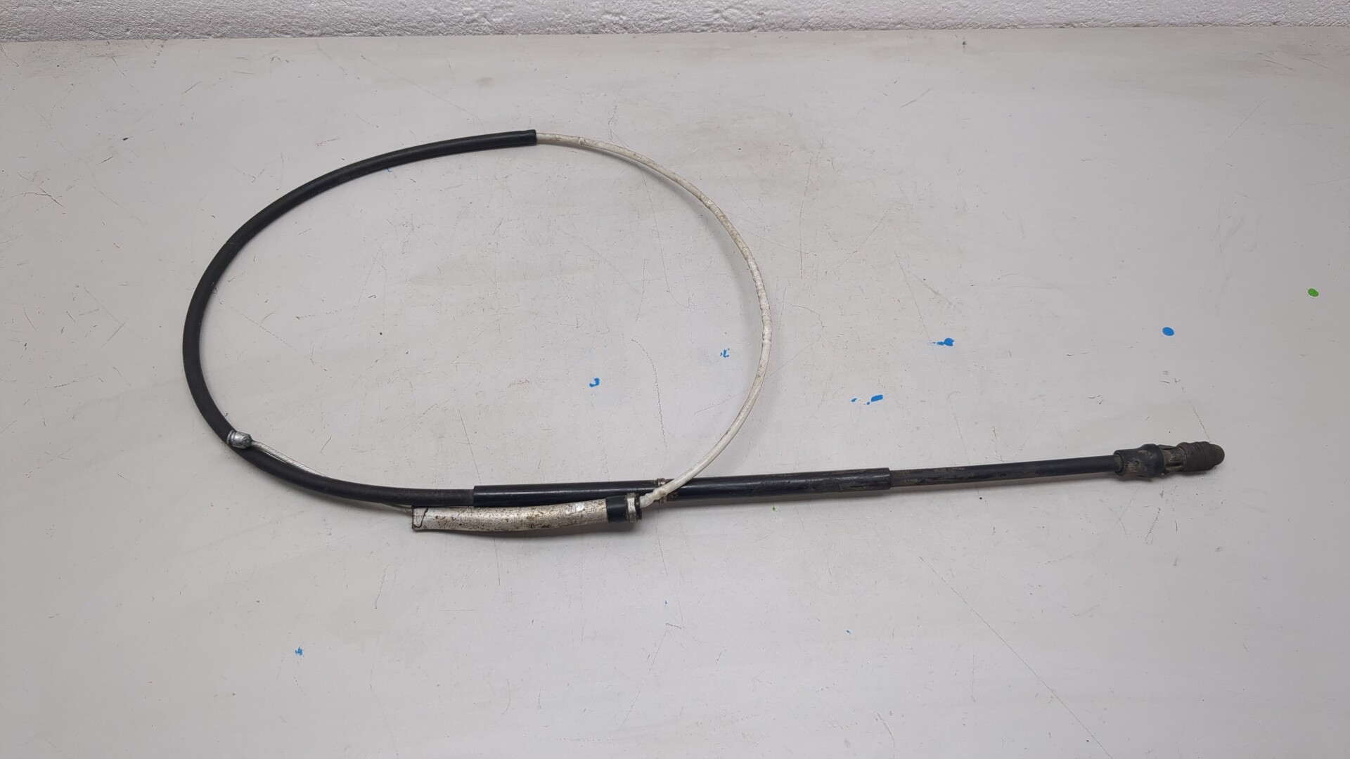 Трос стояночного тормоза