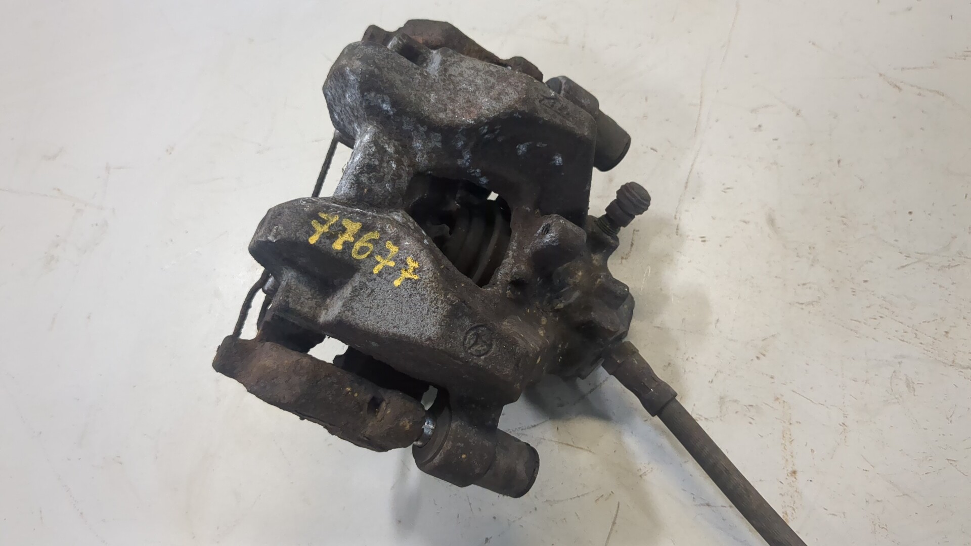 Суппорт задний левый